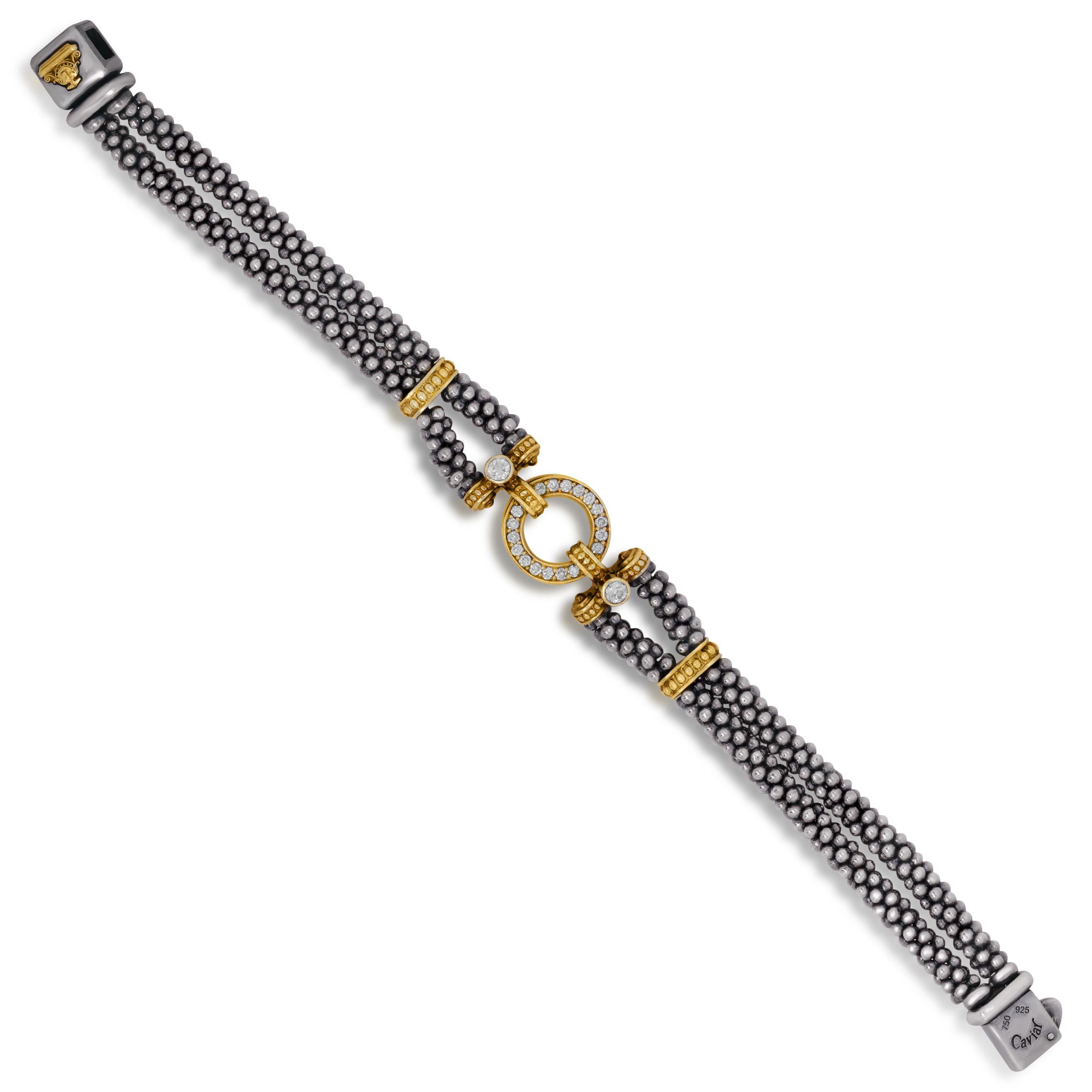 Lagos Sterling Silver 18 Karat Gold Diamond Enso Circle Game Caviar Bracelet

This double strand bracelet by Lagos features an 18k gold and diamond center

0.67 carat diamonds total weight

Bracelet is 7 inches in length by 0.55 inch width.

Signed