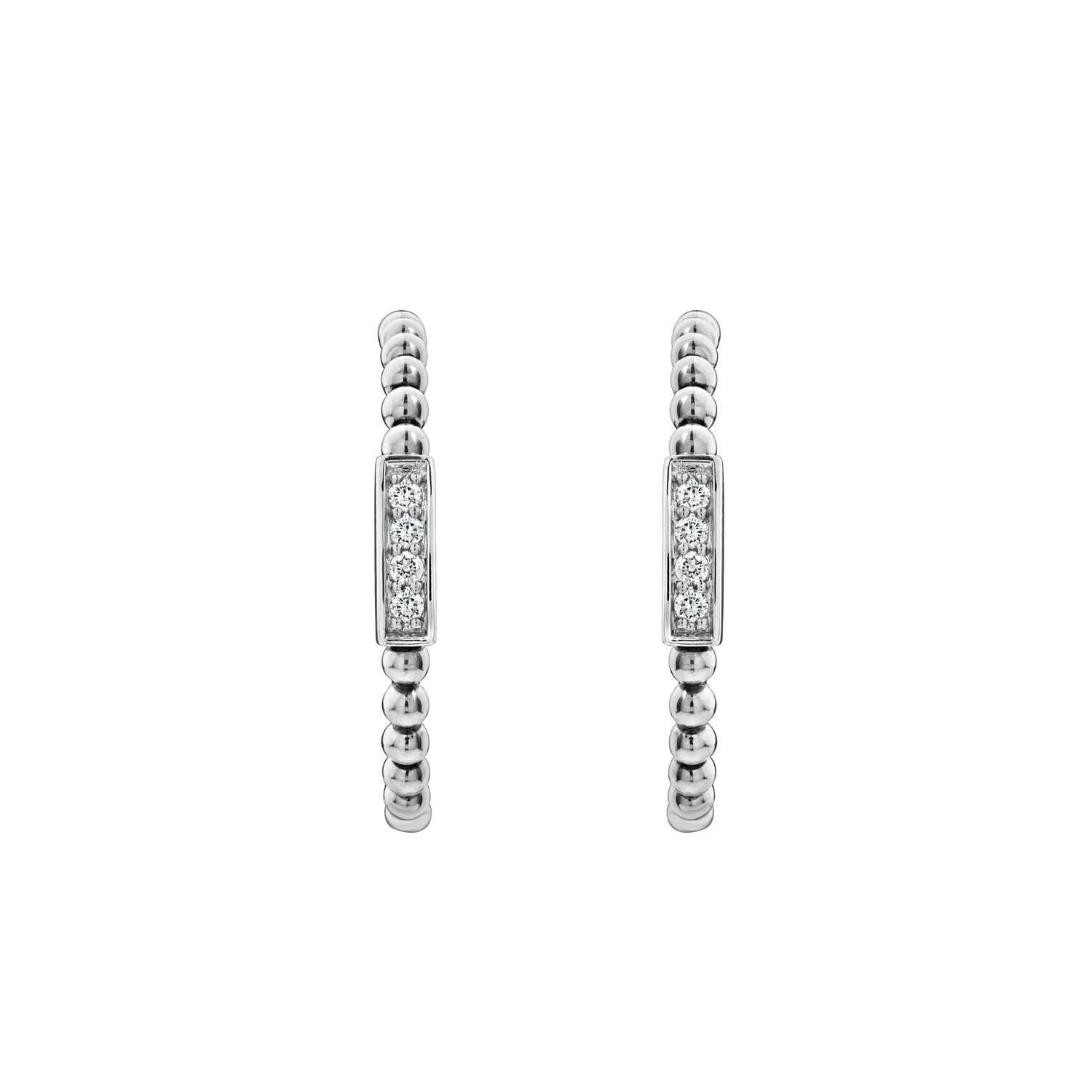 Diamond hoop earrings with sterling silver Caviar beading. Finished with 14k gold post backing.