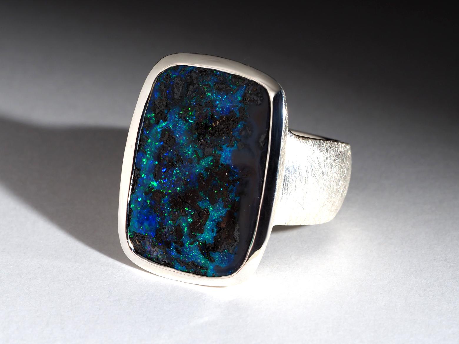 Large statement silver ring with natural Boulder Opal
Opal gemstone origin - Australia
opal measurements  - 16 x 23 mm / 0.62 x 0.90 inches 
ring weight - 15.9 grams
ring size - 9.5 US, diameter 19 3/4 mm, N 21, circumference 61
weight of Opal of
