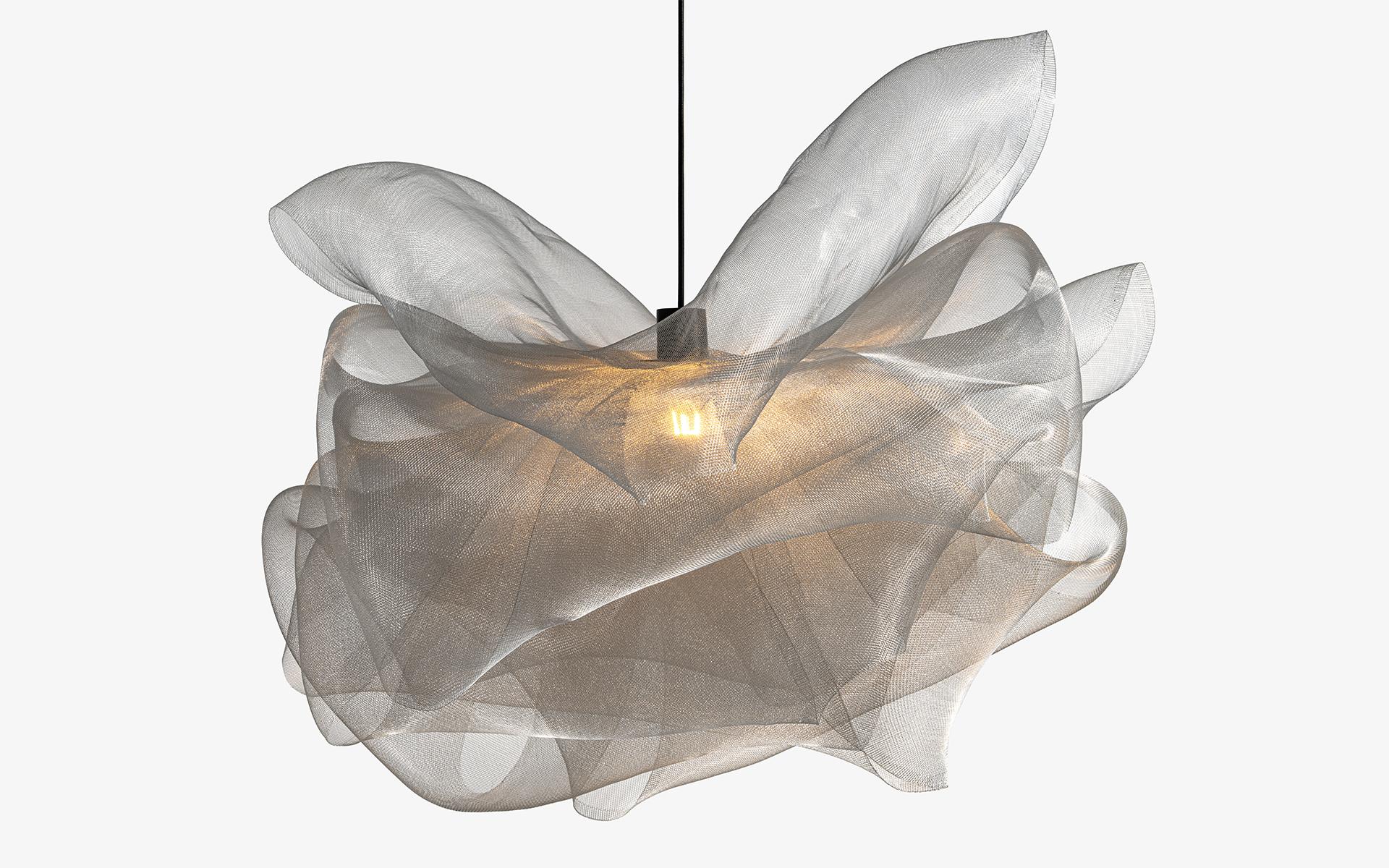 Kumo Pendant Lighting resembles a cloud floating in the air with its light and elegant form.

Thanks to its handcrafted twisted stainless steel wire, it diffuses the light softly and adds a warm atmosphere to the space.

Kumo, which is compatible