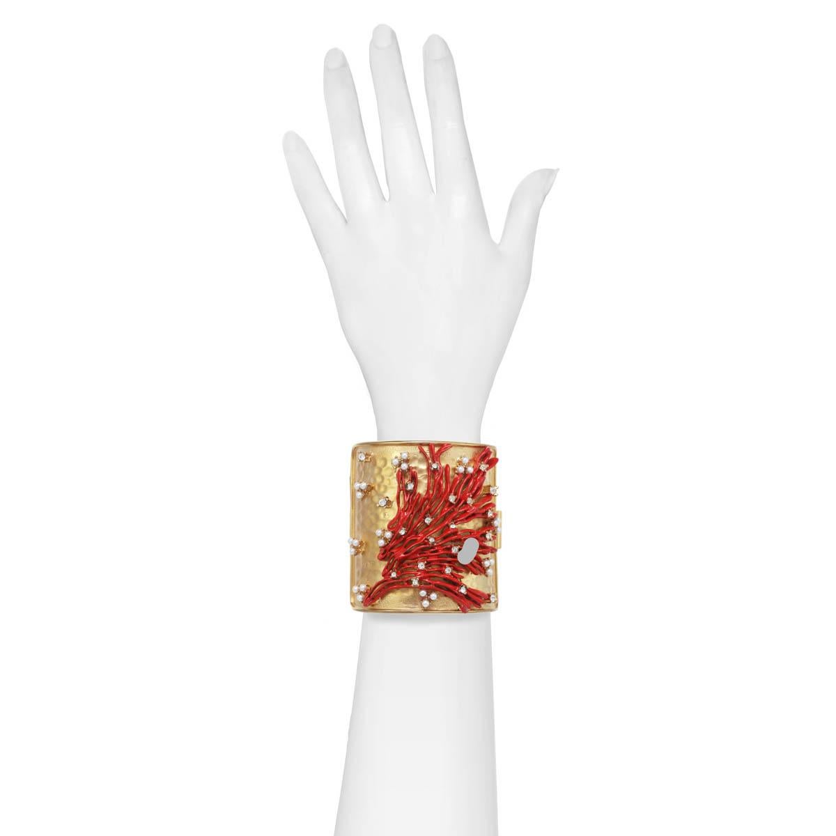 Living Gold, Red & Pearl! 
“Laguna” is an Italian name meaning “A body of water cut off from a larger body by a reef of sand or coral”, perfectly suited to this gorgeous statement cuff. This elegant statement piece looks gorgeous dressed down in the