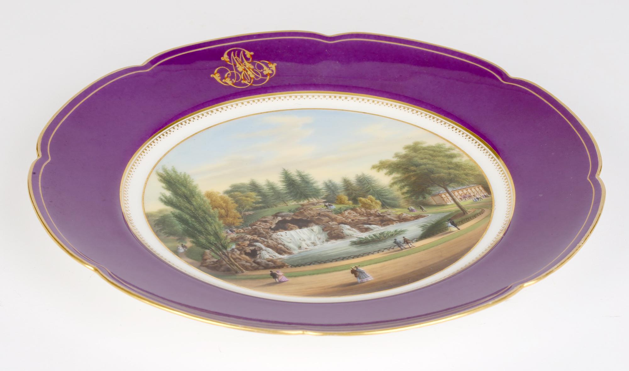 A very fine and exquisitely hand painted French porcelain cabinet plate with a scene titled Grande Cascade du Bois de Boulogne made by Lahoche et Pannier, Palais Royal, Paris and dating from around 1870. The scene is beautifully painted and set