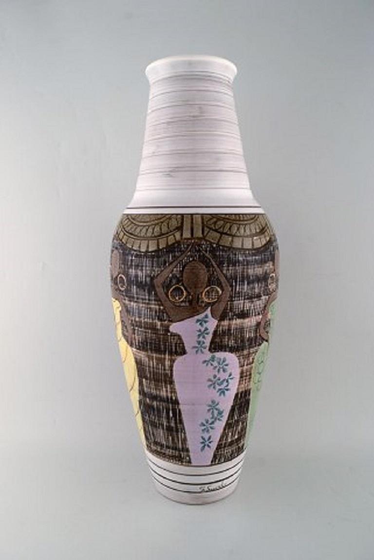 Laholm keramik. Colossal unique floor vase in glazed ceramics with negresses in colorful dresses, 1950s-1960s.
Signed.
Measures: 59 x 22 cm
In very good condition.