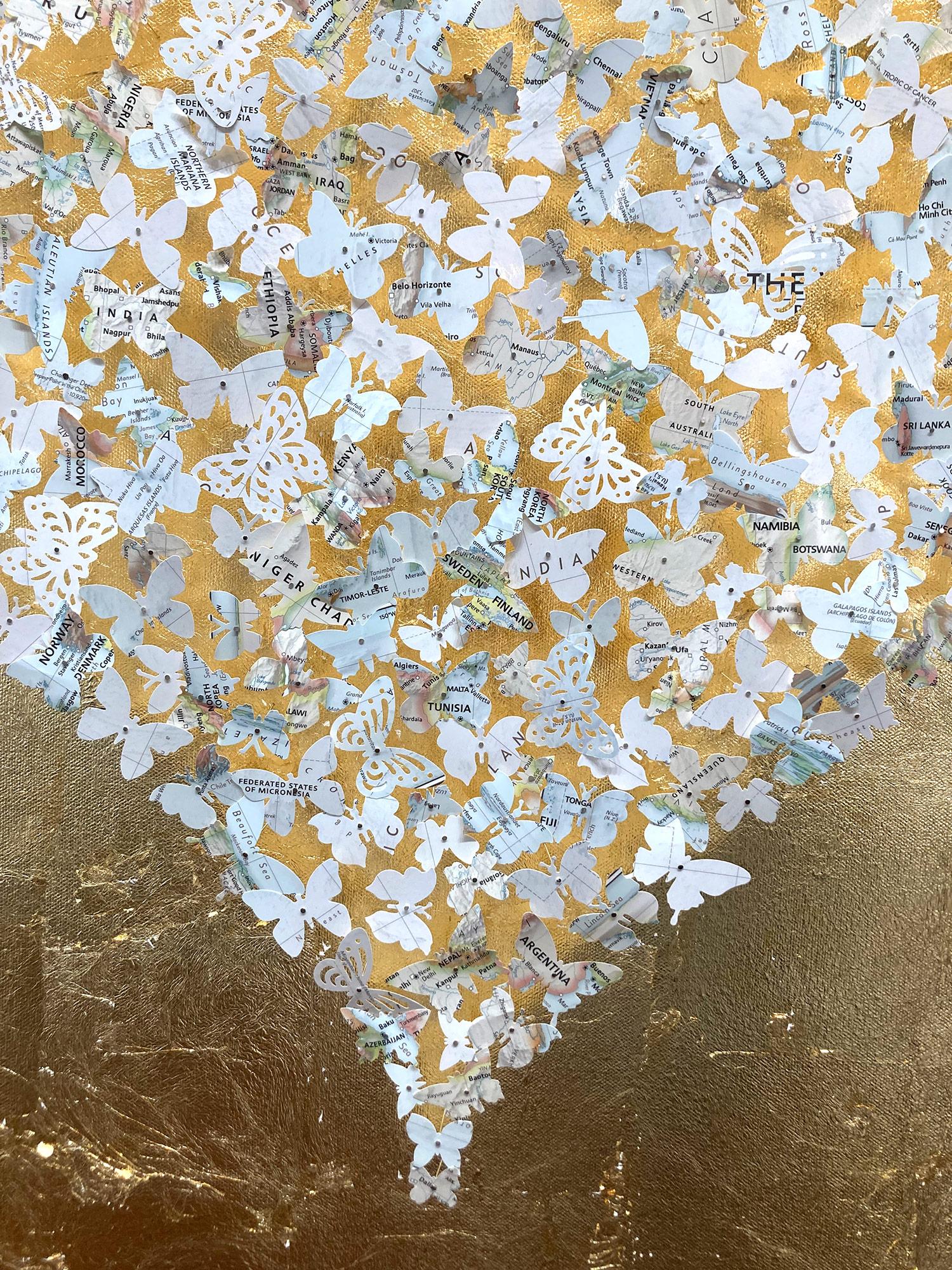 This piece is executed with hundreds of hand cut butterflies over a glowing gold leaf back ground. Comes displayed in an acrylic shadow box. These works conjure sensations of nostalgia, created from maps, cutting out words, symbols, and places to