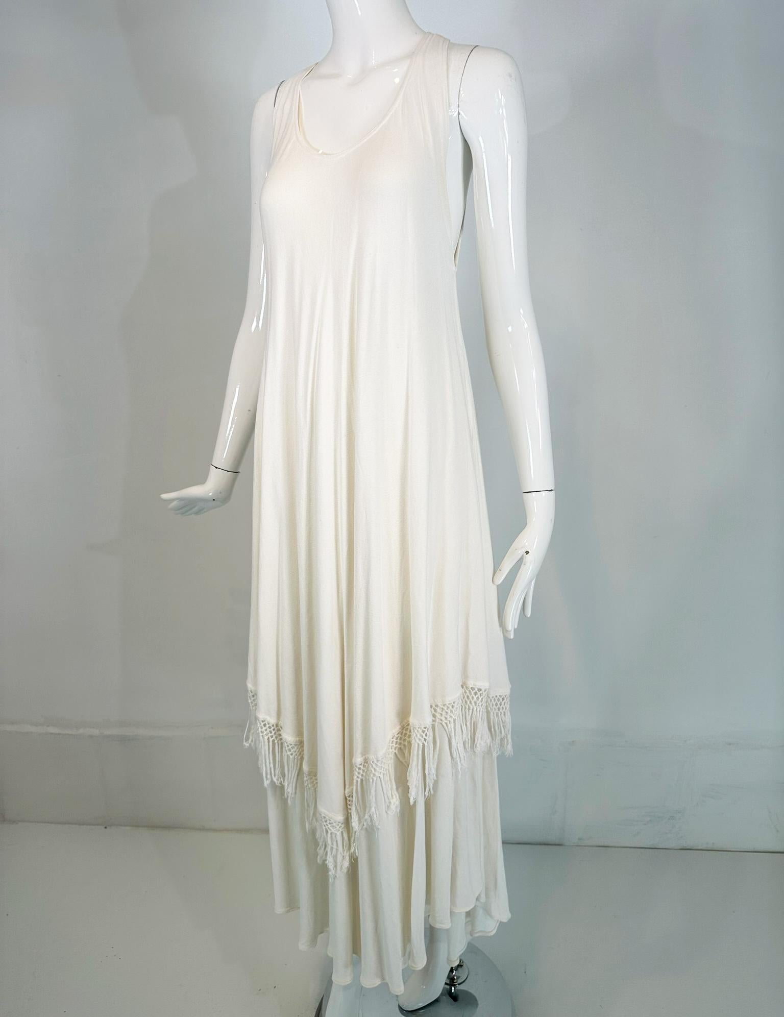 Laise Adzer off white racer shoulder maxi layered fringe hem sleeveless dress from the 1990s. Soft rayon 80% cotton 20% blend off white summer dress Laise Adzer Morocco. Cut in shoulder front & back, the bias cut dress is fitted through the bust and