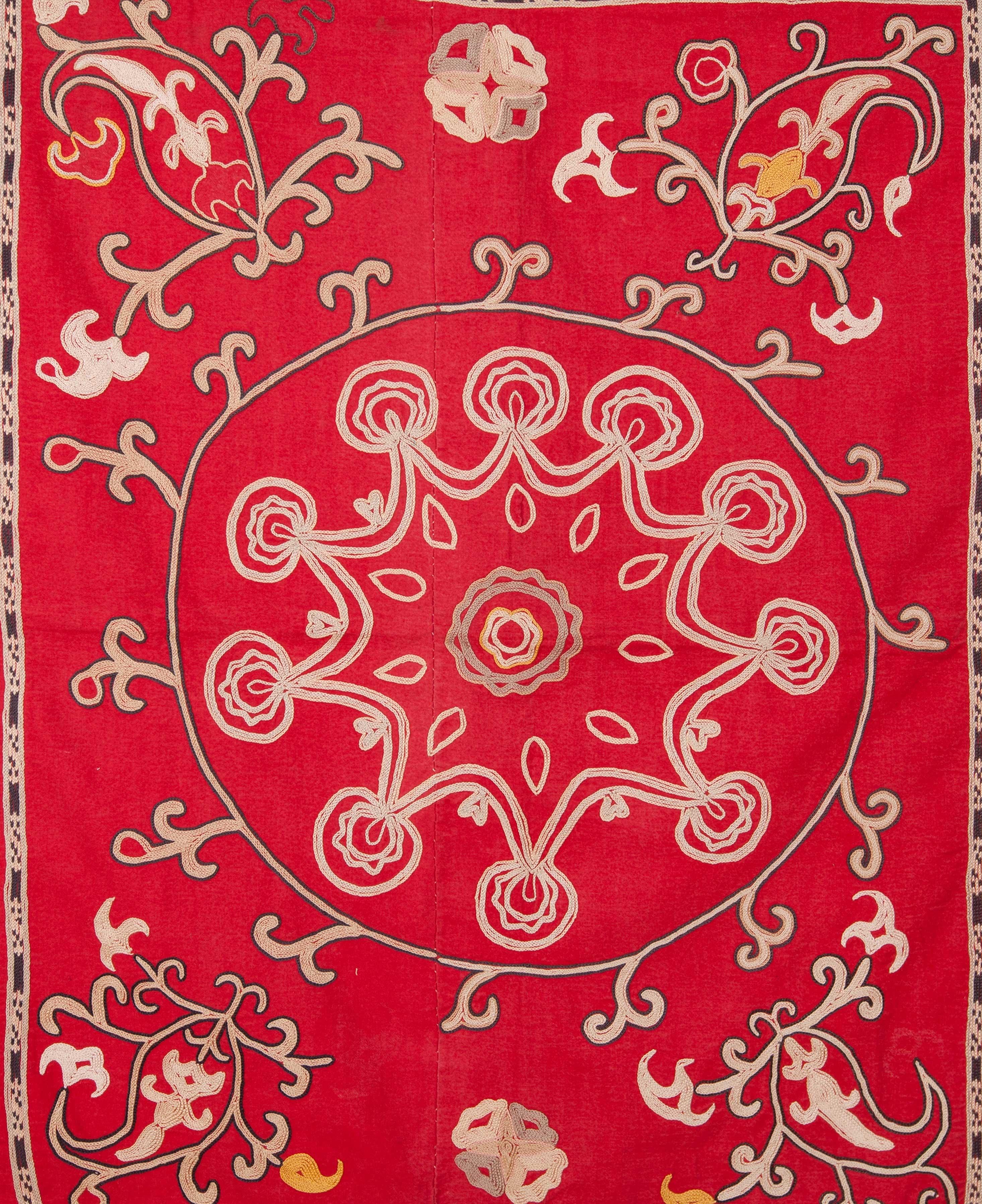 This small Suzani displays all the features of a Lakai embroidery done on a red color trade cloth, 1900s.
 
