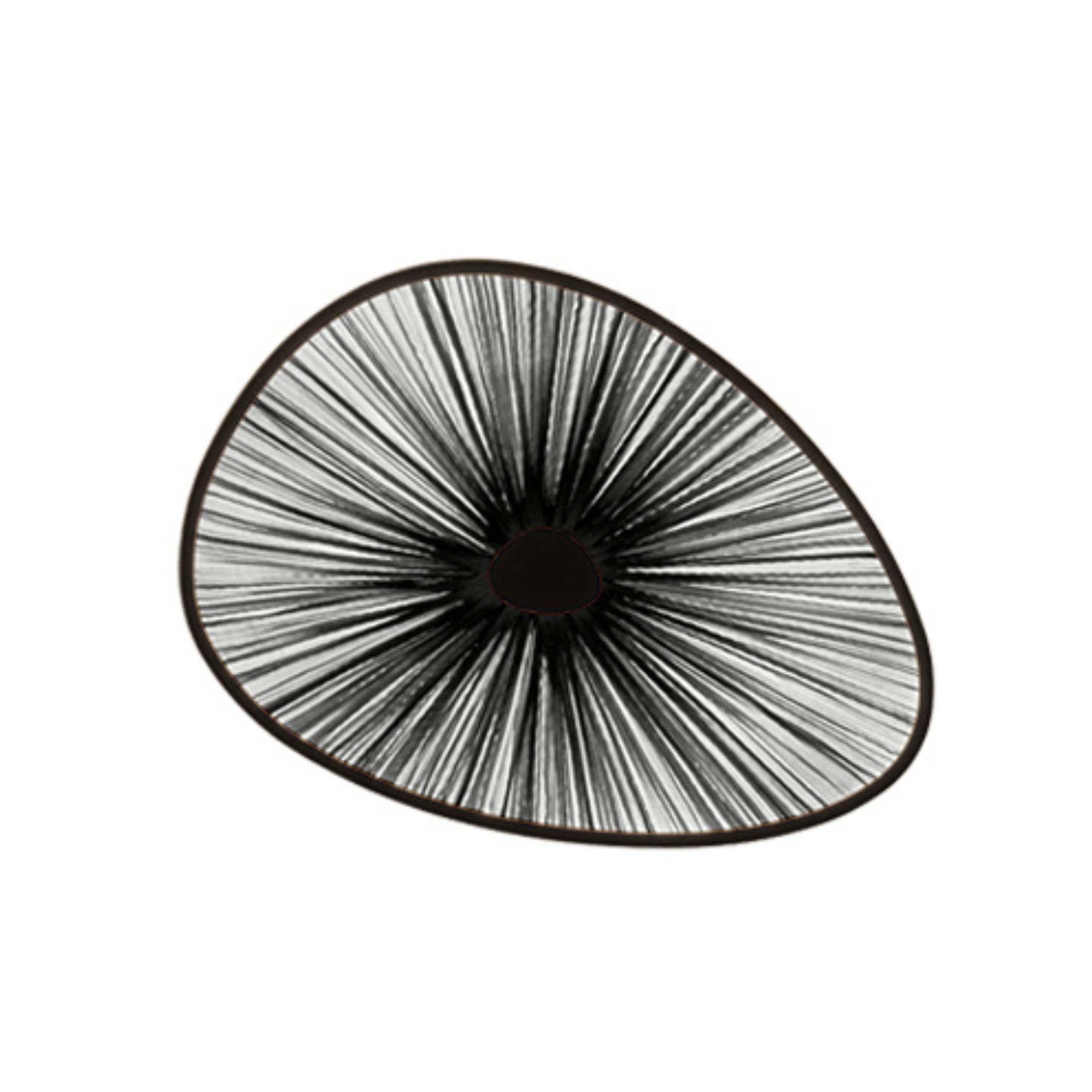 The Lake Doiran Wall & Ceiling Light is a stunning lighting fixture that elegantly showcases its luminous glow against the wall. The rotating shades create a beautiful interplay of colors, adding a touch of drama to any space. This exquisite design