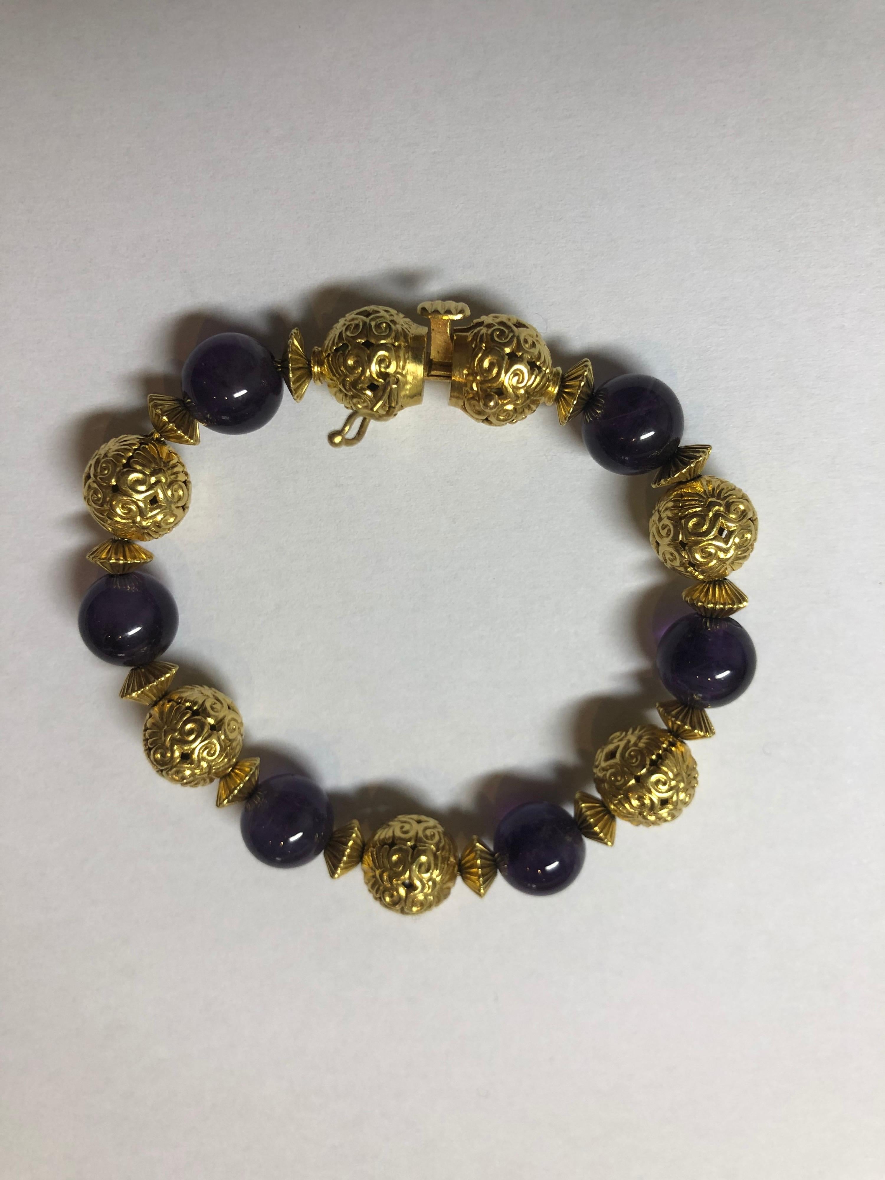 A very stylish amethyst and gold bracelet by renowned Greek designer Lalaounis. 