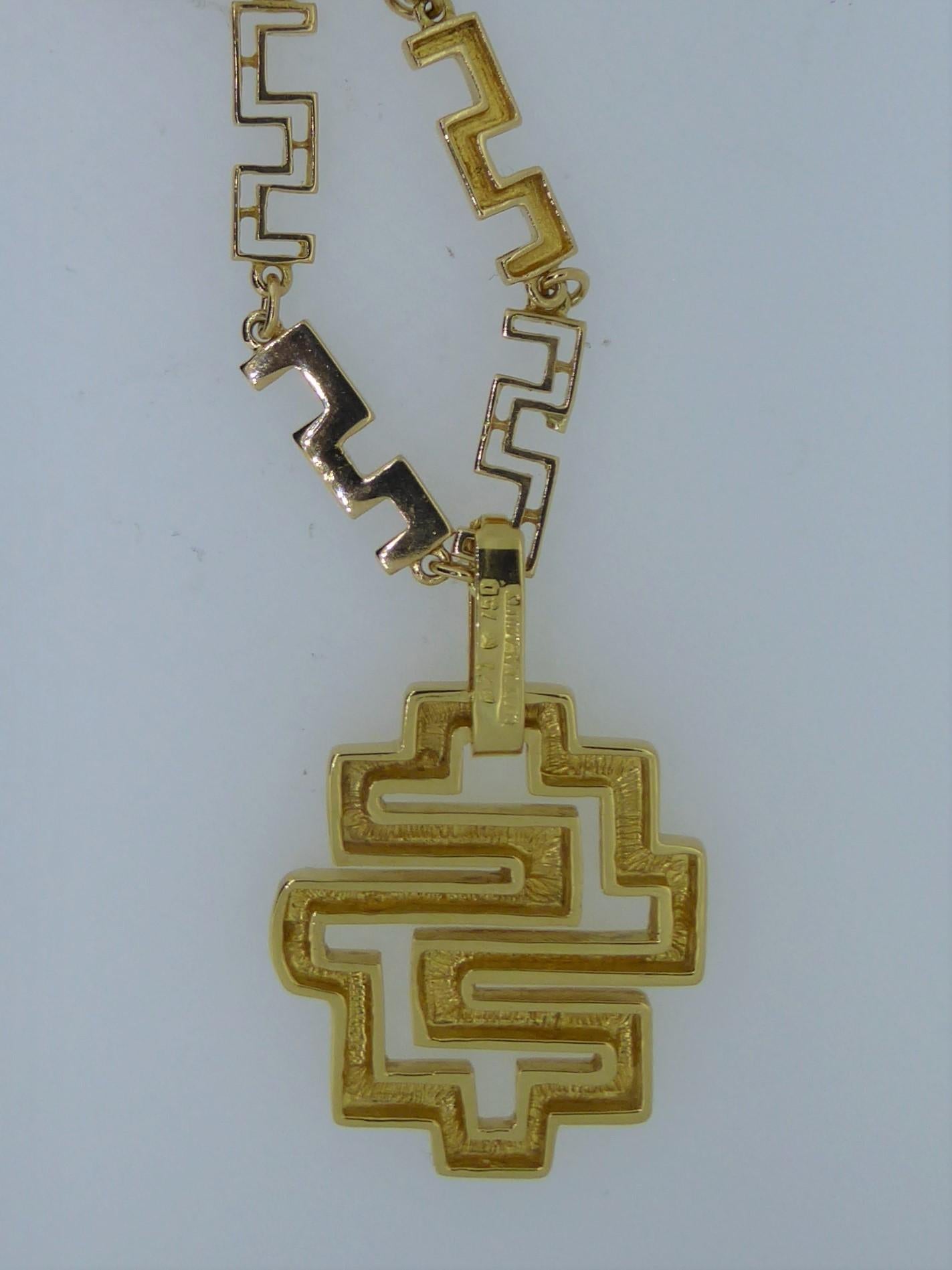 A Lalaounis 18 Carat Yellow Gold Geometric Link Labyrinth Pendant Necklace. Circa 1990s. The geometric gold links suspending a detachable labyrinth pendant. Stamped 