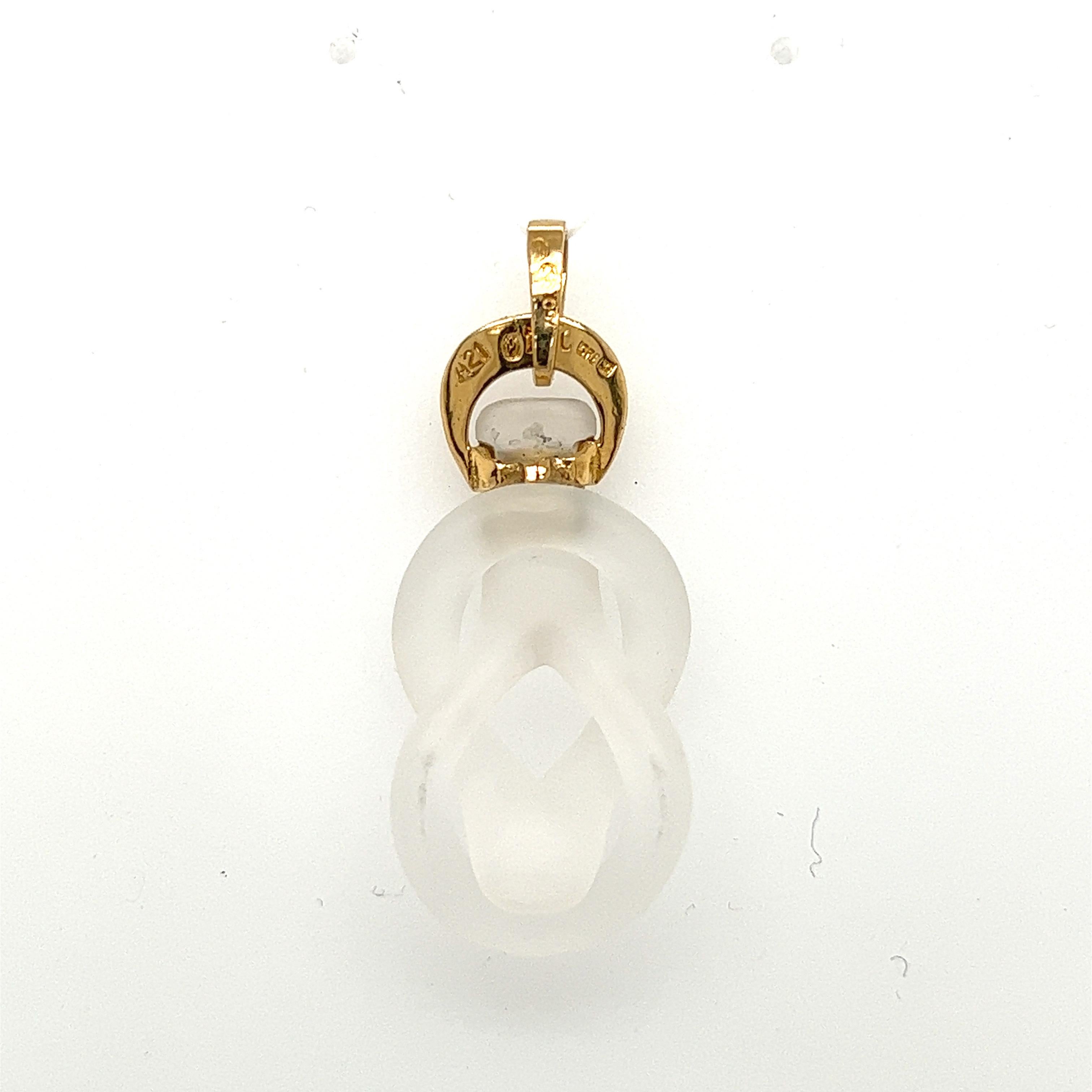 Meaningful 18 karat yellow gold and rock crystal 