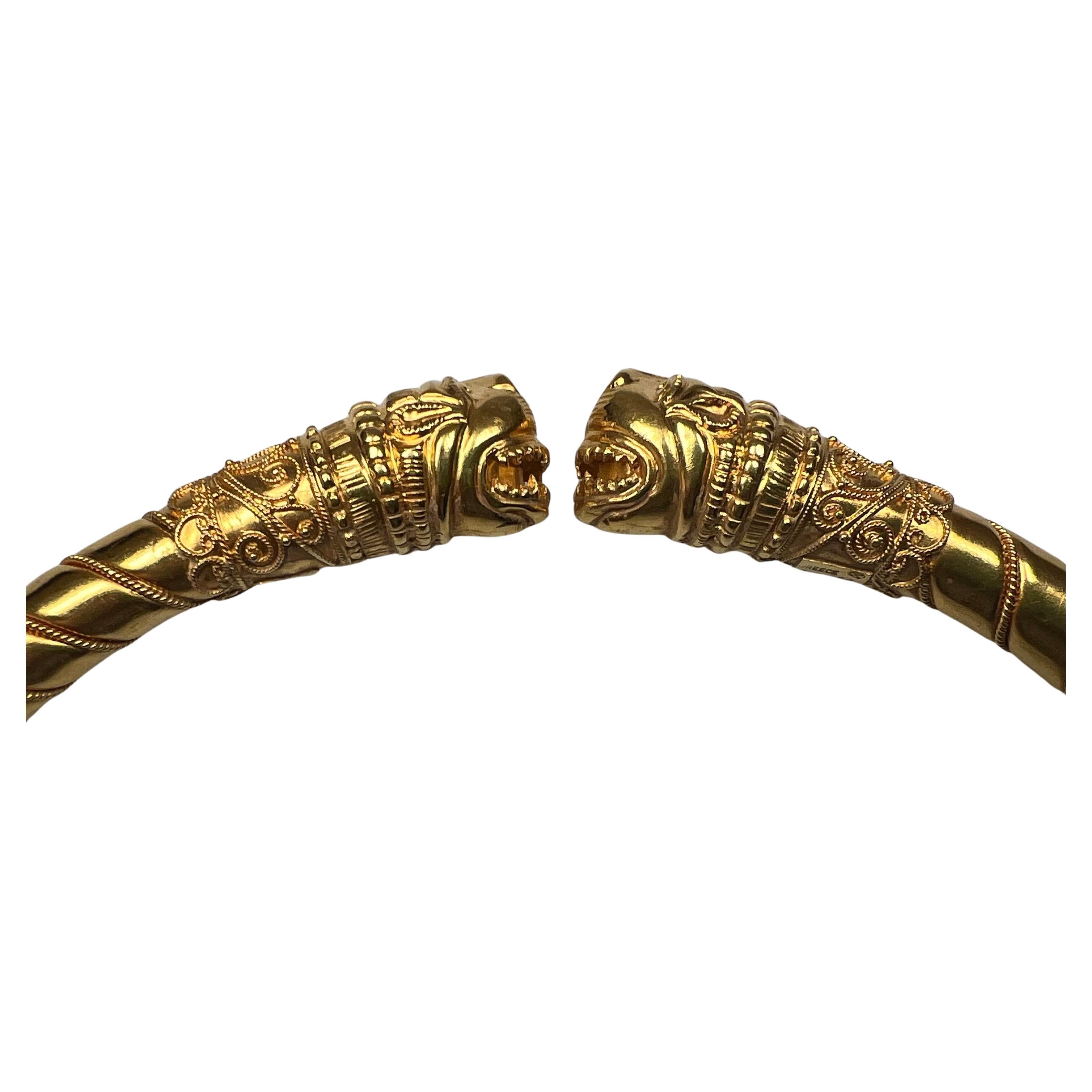 Magnificent 18 karat yellow gold torque/choker necklace by Greek Master Ilias Lalaounis, early 1990s.

Hellenistic style rigid necklace masterfully crafted in 18 and 22 karat yellow gold interwoven with corded goldwire and ending by two finely