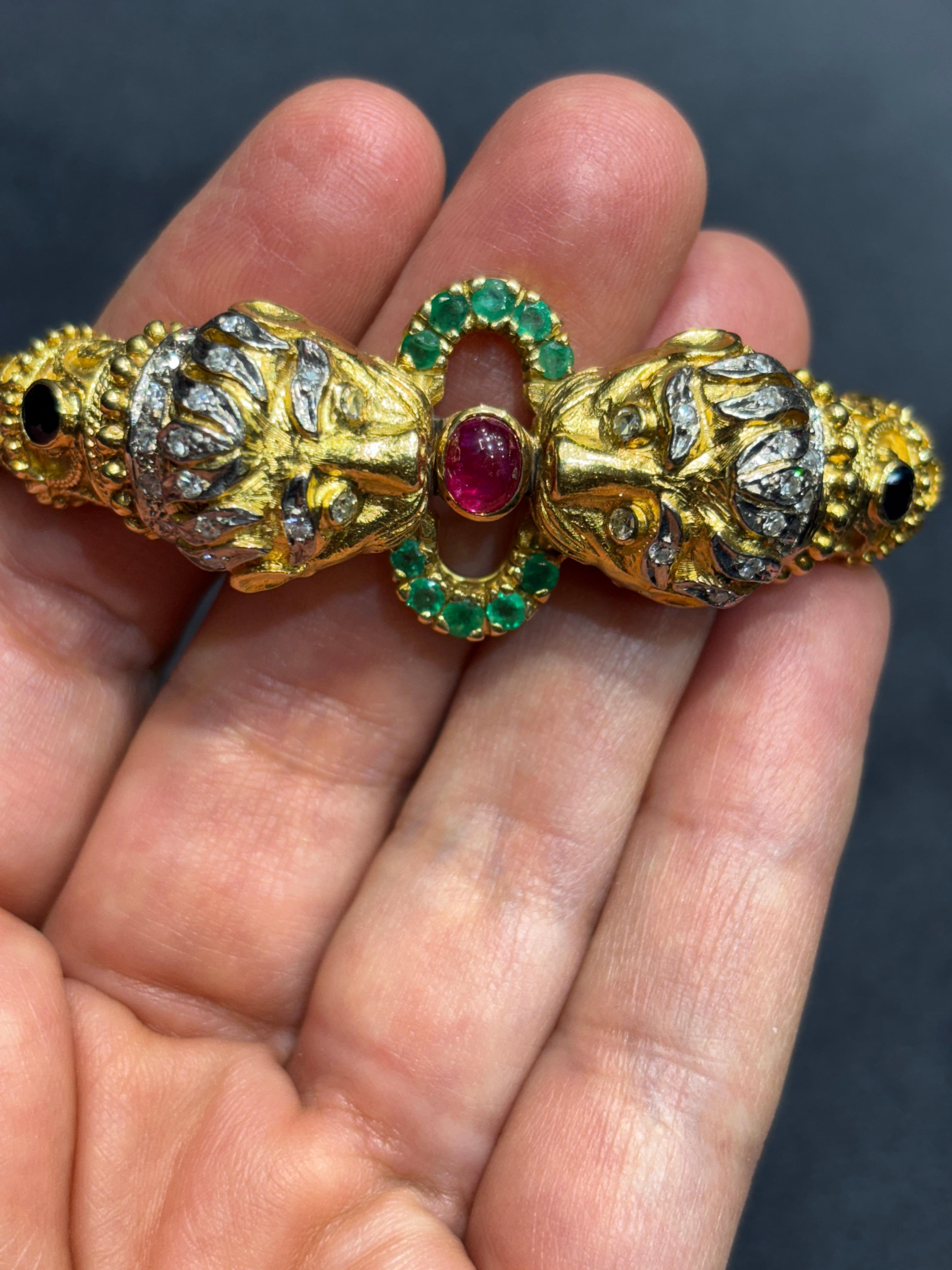 Round Cut Lalaounis 18k gold lion's head bangle with diamonds, rubies, emeralds, sapphires For Sale
