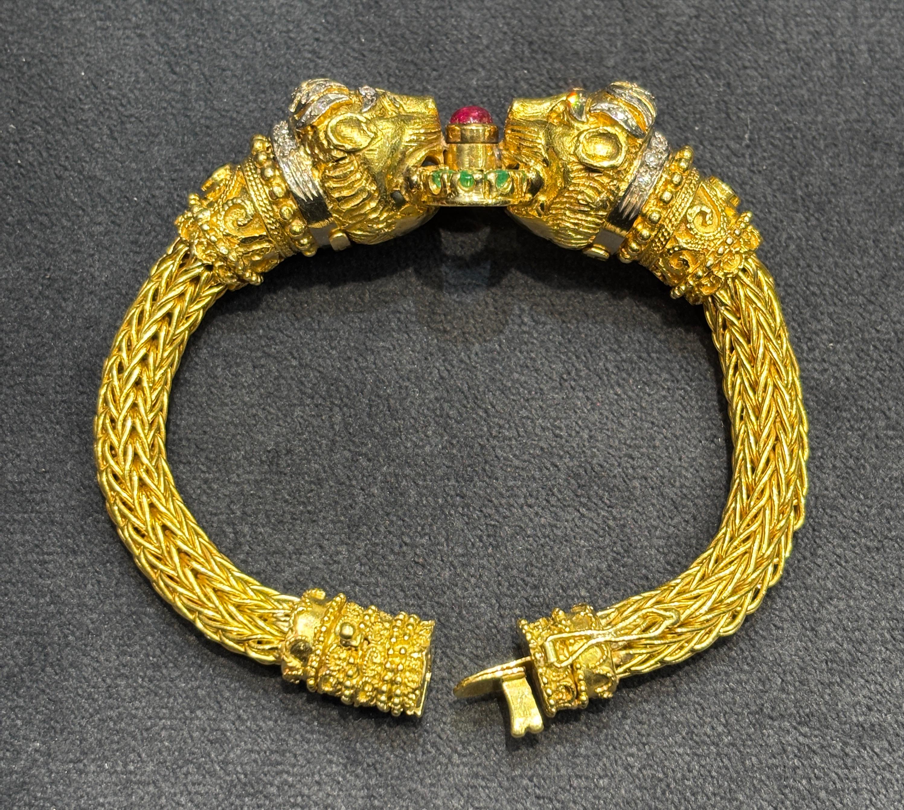 Women's or Men's Lalaounis 18k gold lion's head bangle with diamonds, rubies, emeralds, sapphires For Sale