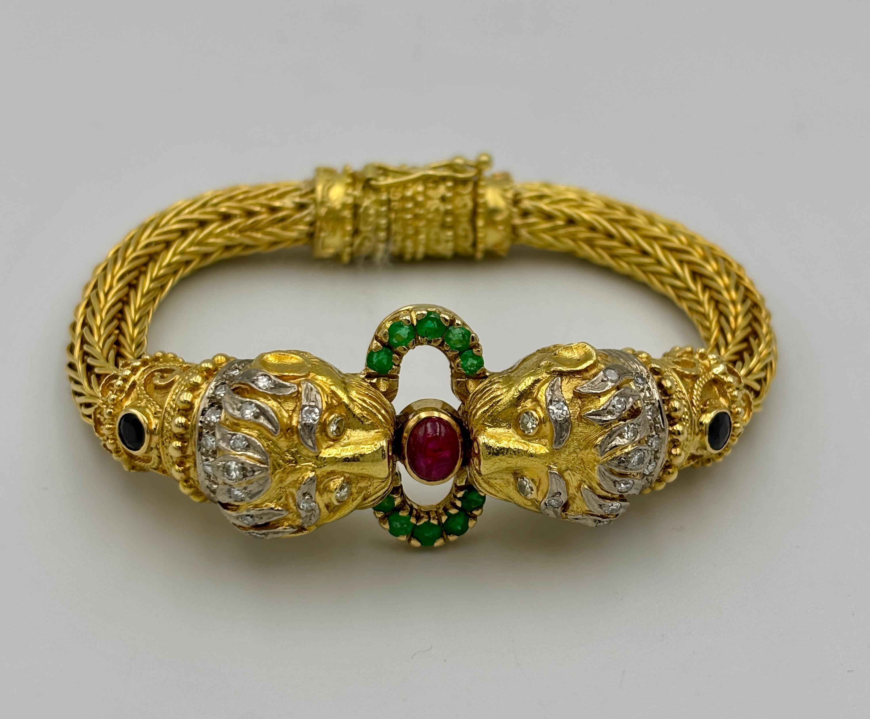 Lalaounis 18k gold lion's head bangle with diamonds, rubies, emeralds, sapphires For Sale 1