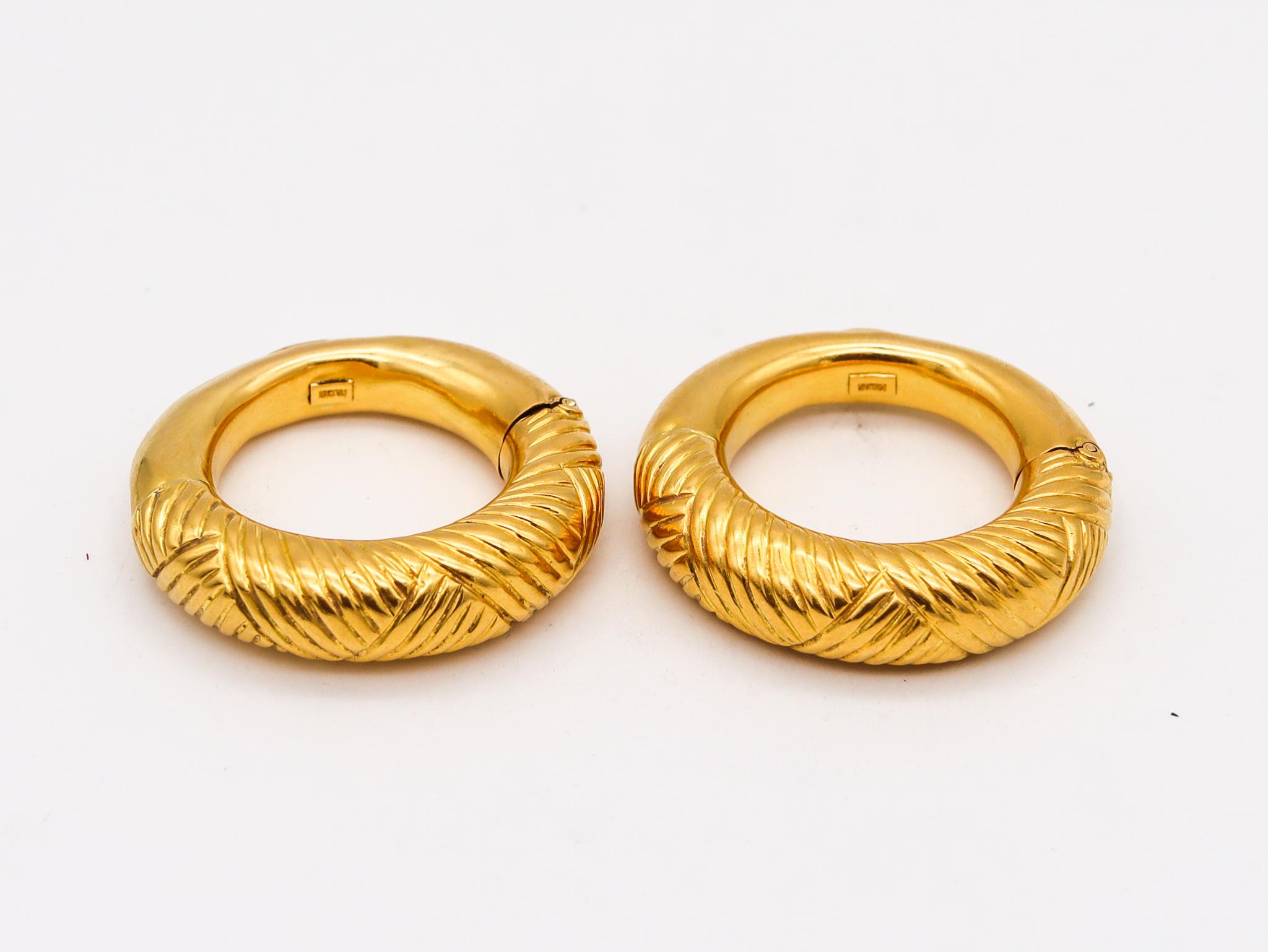 A pair of hoops earrings designed by Ilias Lalaounis.

Gorgeous pair of hoops earrings, created in Greece by the jewelry house of Ilias Lalaounis, back in the 1970's. These beautiful vintage and bold pair are part of the collection named the Minoans