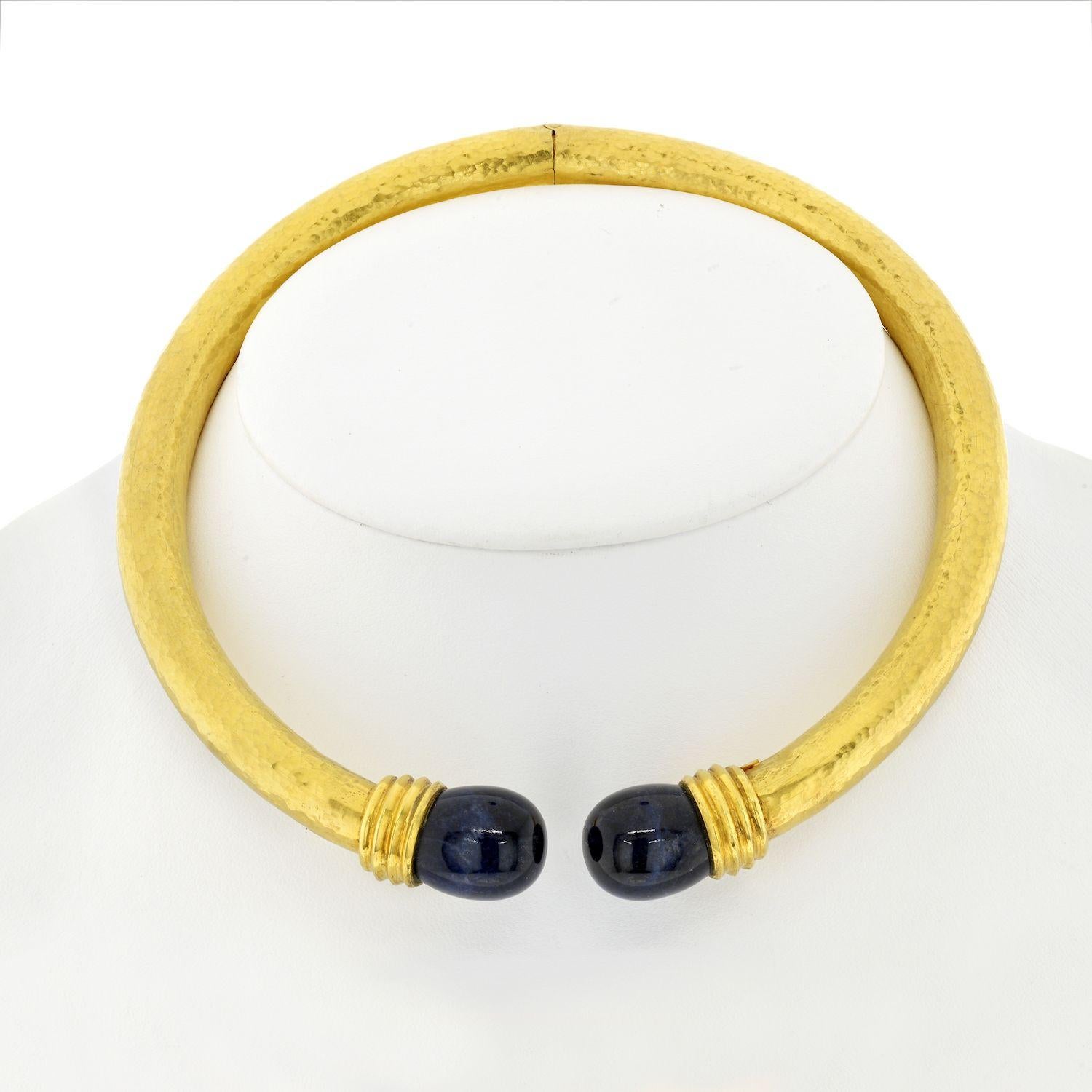 Feel immaculate and strong with this stunning Antique LALAOUNIS Sodalite 22K Gold Textured Collar Necklace!  This necklace is crafted is quality 22 karat yellow gold with a hammered texture. 
 It has a hinge in the back for neckline adjustment. 