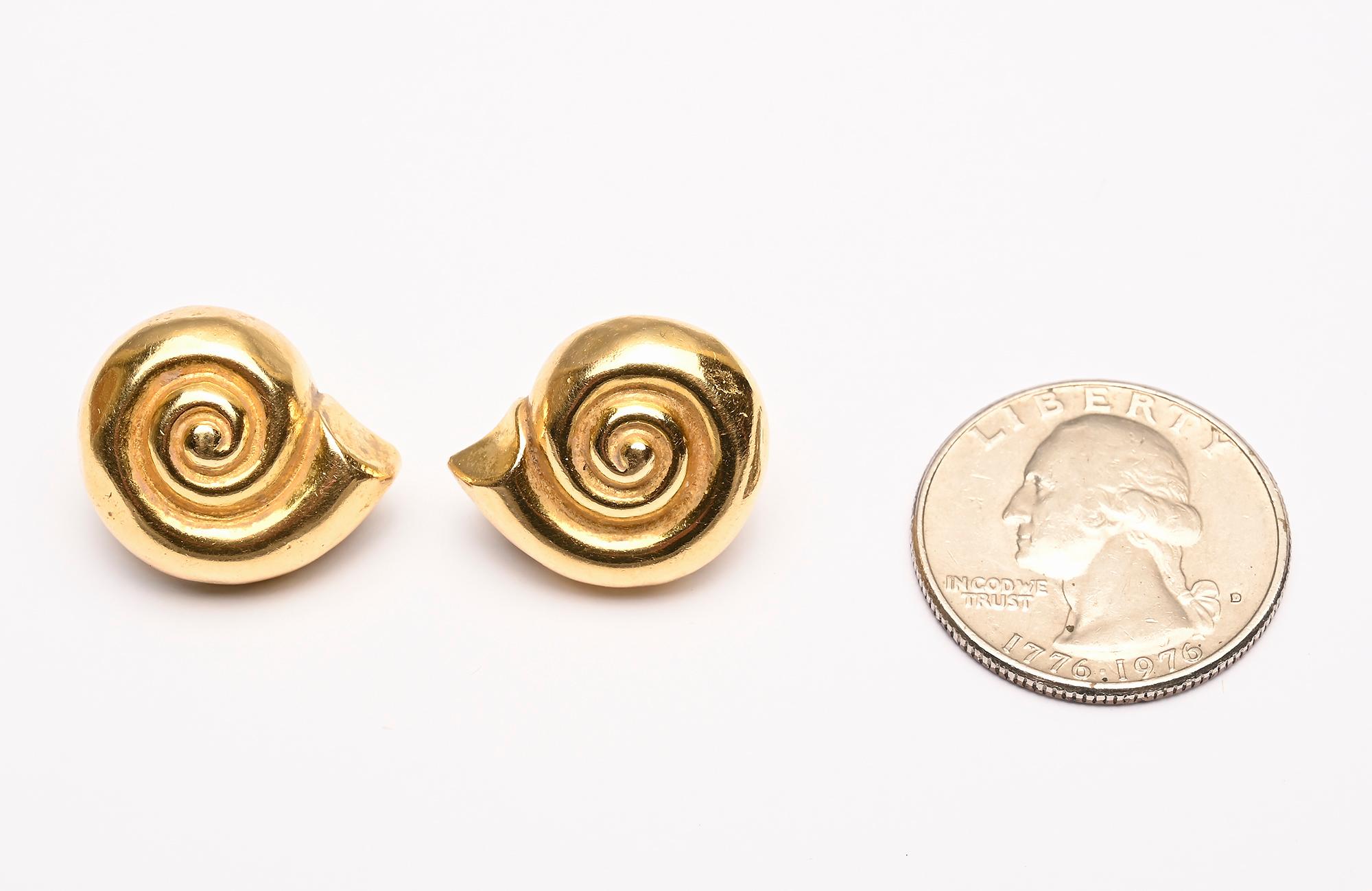 Coiled gold earrings by famed Greek designer, Ilias Lalaounis. The earrings have a three dimensional spiral. Clip backs can be converted to posts.
Casual enough to be worn all day yet making enough of a statement for evening.