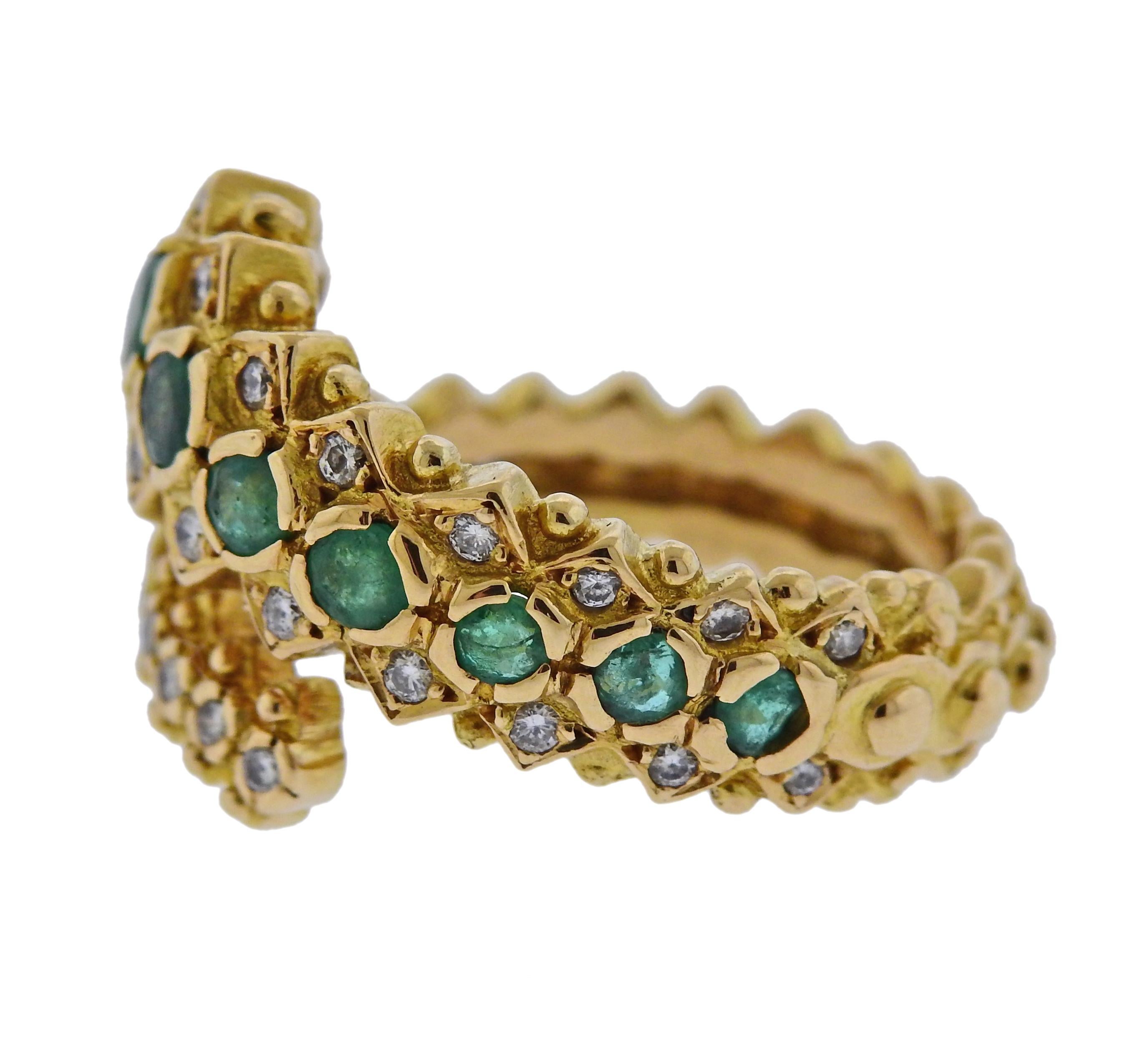 18k yellow gold ring, designed by Lalaounis, decorated with emeralds and approx. 0.26ctw in diamonds.  Ring size - 8.25, ring top is 16mm wide, weighs 11.7 grams. Marked:  750, A21, Maker's hallmark.  