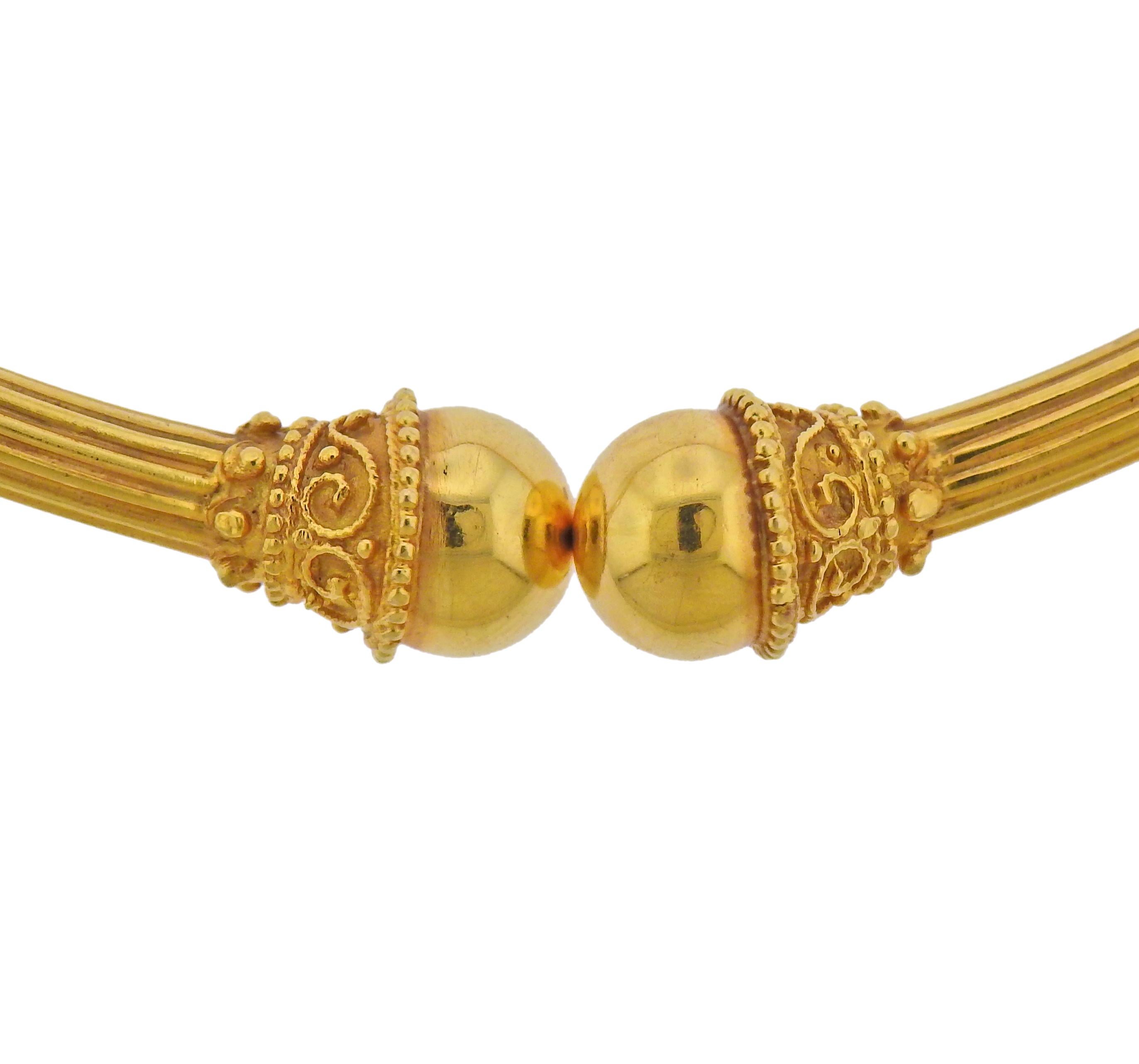 Ilias Lalaounis 18k gold collar necklace.  Necklace will fit an average 14