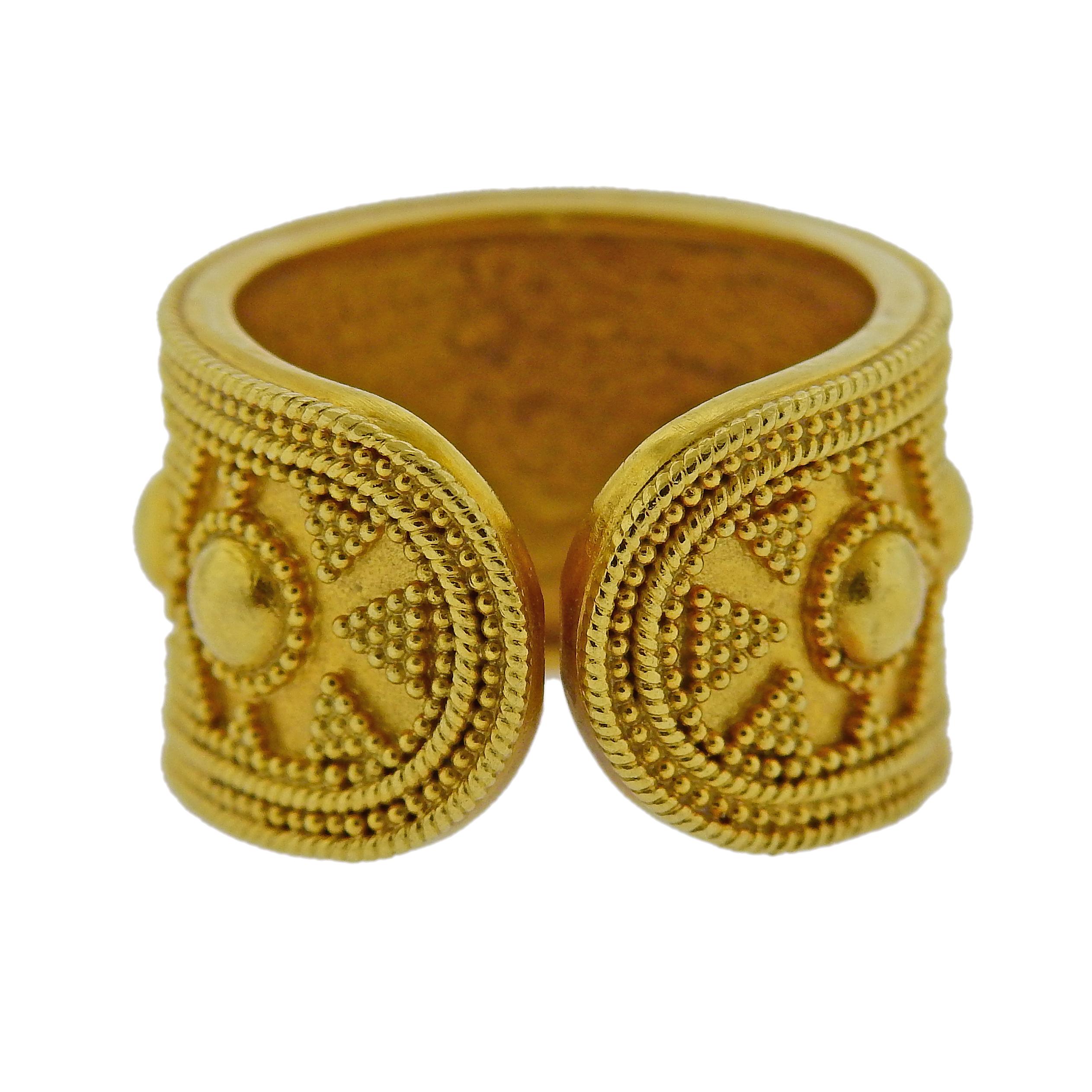 18k yellow gold cuff design beaded band ring by Greek designer Ilias Lalaounis. Ring size - 6, ring is 13mm wide. Weight is 11.6 grams. Marked H17, 750, Greece, Maker's symbol mark.