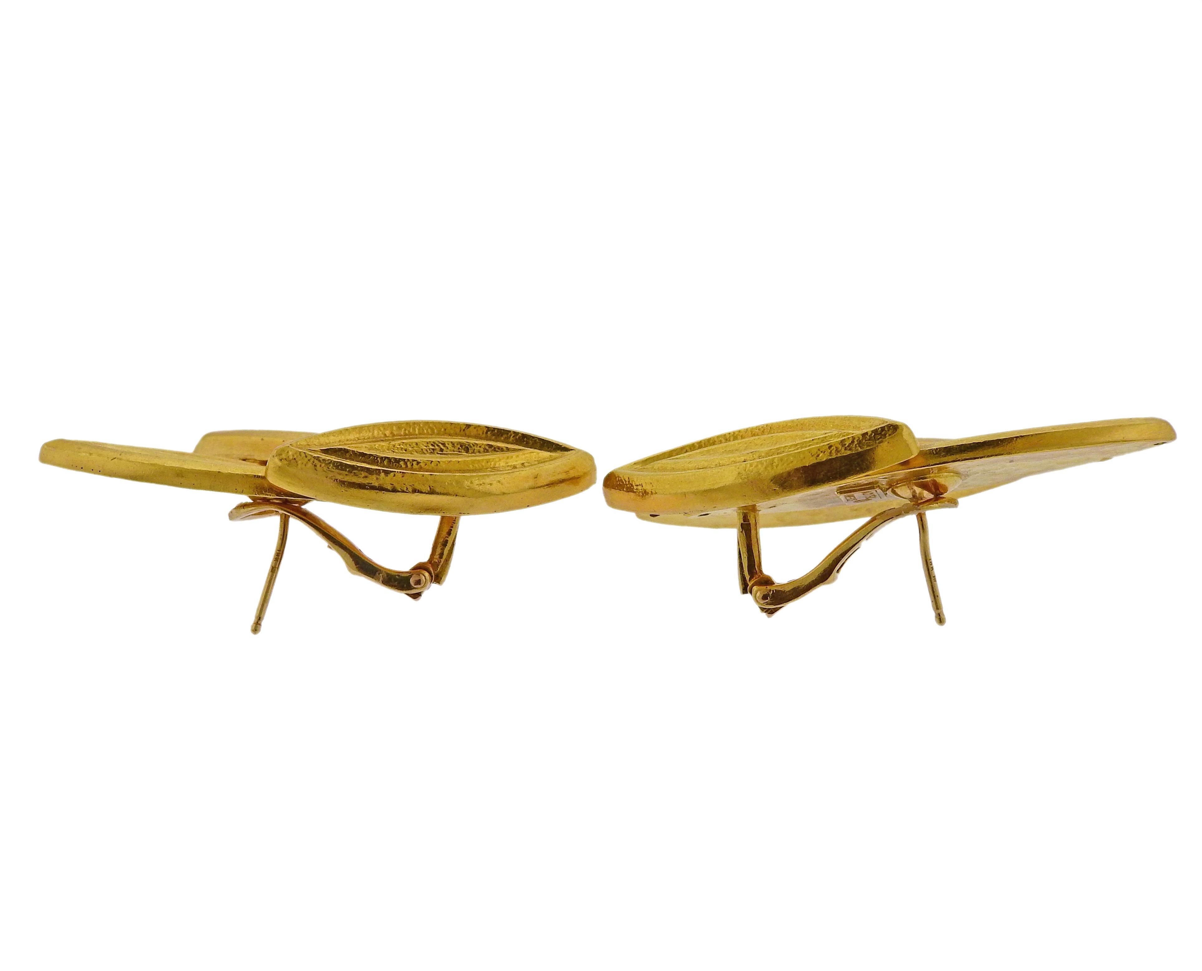 Pair of 18k yellow gold leaf motif earrings, crafted by Greek designer Ilias Lalaounis. Earrings measurements are 46mm x 25mm. Weight is 29.3 grams. Marked: A21, Greece, 750, Maker's mark. 