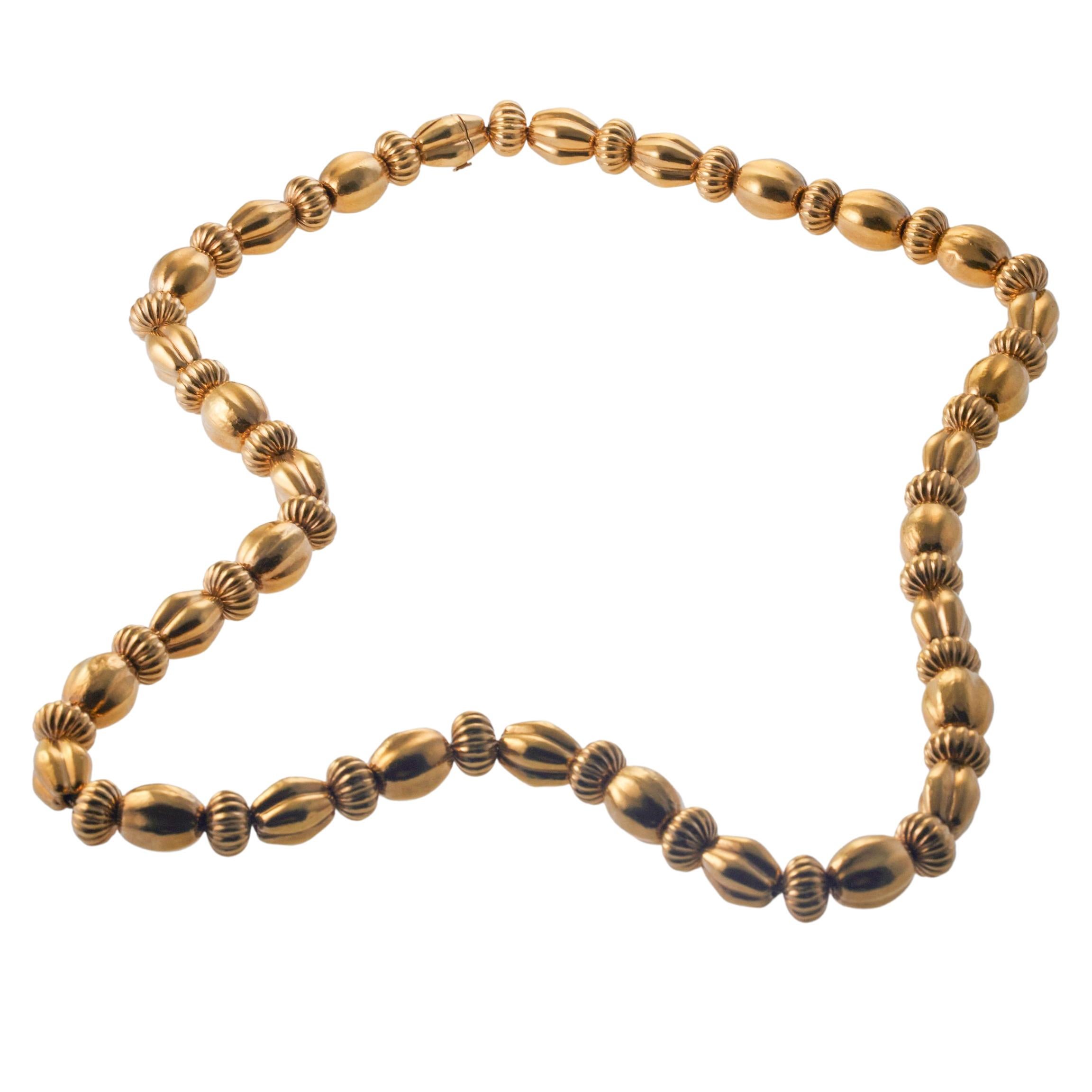 22k gold bead necklace by Ilias Lalaounis of Greece. Necklace measures 30.5