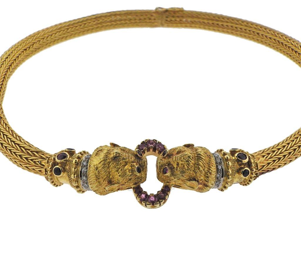 An 18k yellow gold Chimera necklace, crafted by Greek designer Ilias Lalaounis, decorated with approx. 0.28ctw diamonds, rubies and sapphires. Necklace is 15.5