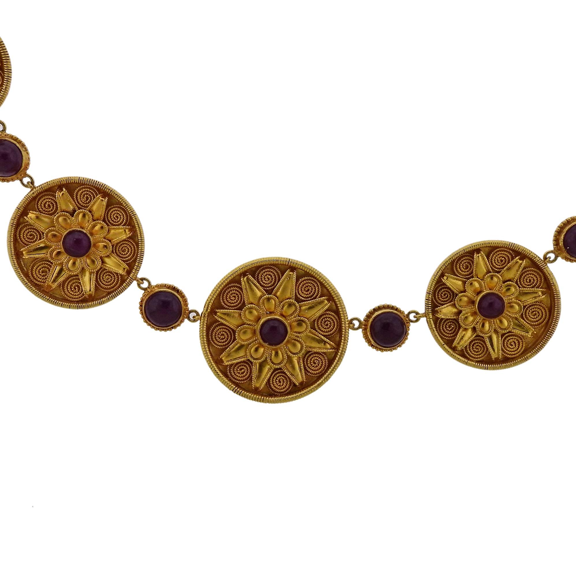 18k yellow gold necklace, crafted by Greek designer Ilias Lalaounis, set with ruby cabochons. Necklace is 18