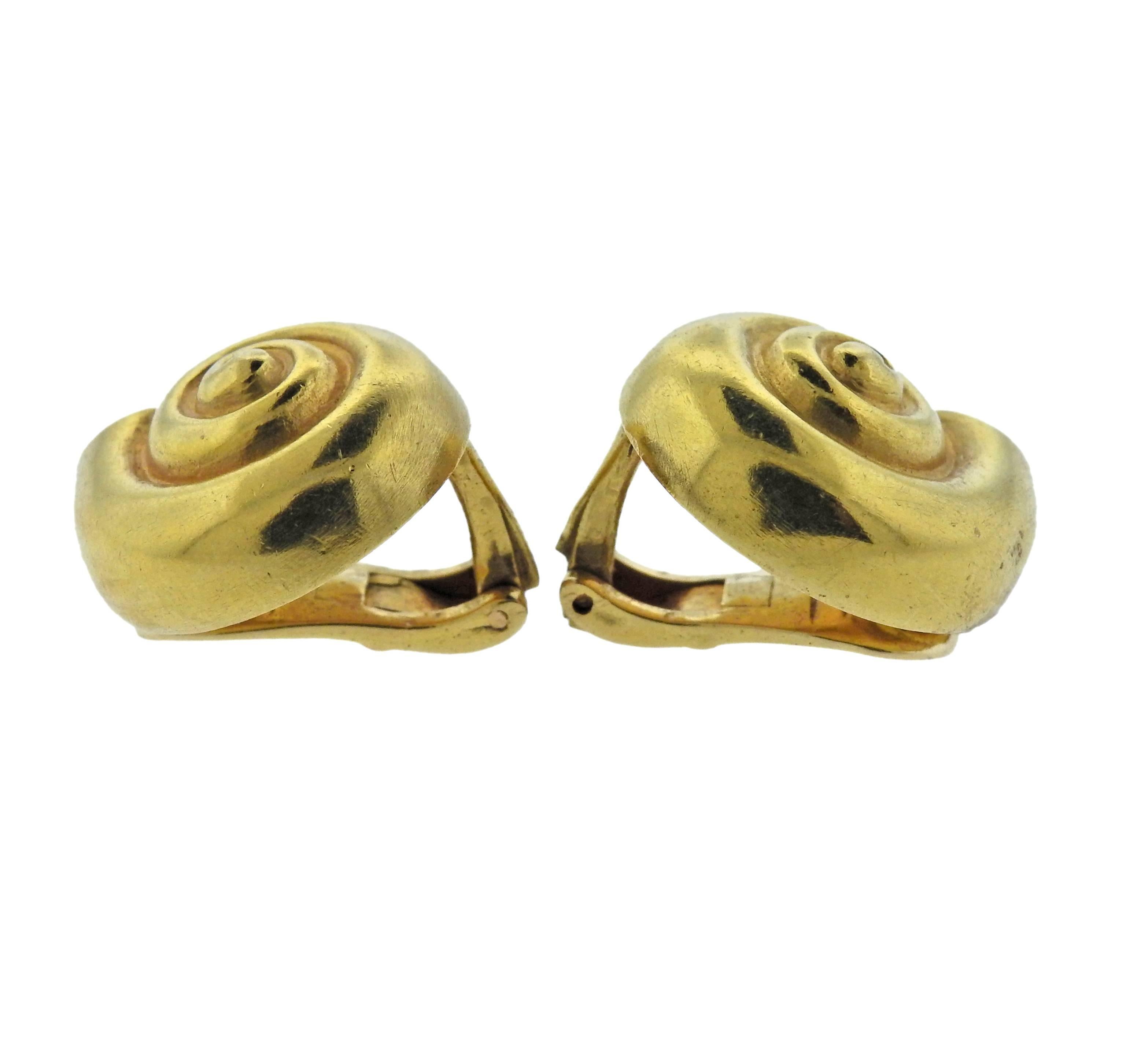  Pair of 18k yellow gold shell motif earrings, crafted by Greek designer Ilias Lalaounis. Earrings are 20mm x 17mm, weigh 12.5 grams. Marked: 750, A21, Greece, Maker's mark. 