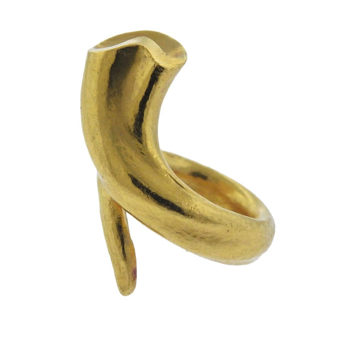 18k yellow gold wrap design ring, crafted by Greek designer Ilias Lalaounis. Ring size - 4, ring top is 28mm wide and weighs 9.2 grams. Marked 750, Ilias Lalaounis hallmark, Greece.