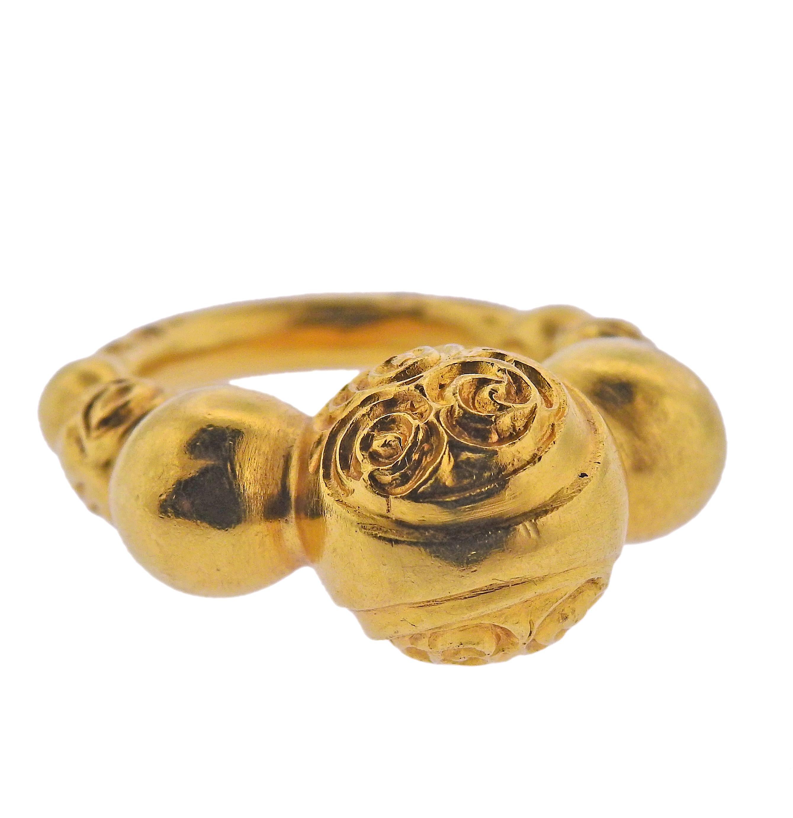 18k yellow gold ring by Ilias Lalaounis of Greece. Ring is a size 6, center ball is 12mm in diameter. Marked with Maker's mark, Greece, 750, A21. Weight - 7.6 grams. 
