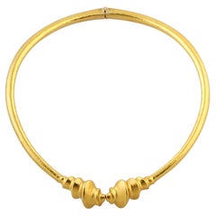Lalaounis, Halskette aus gehämmertem Gold mit Fackel