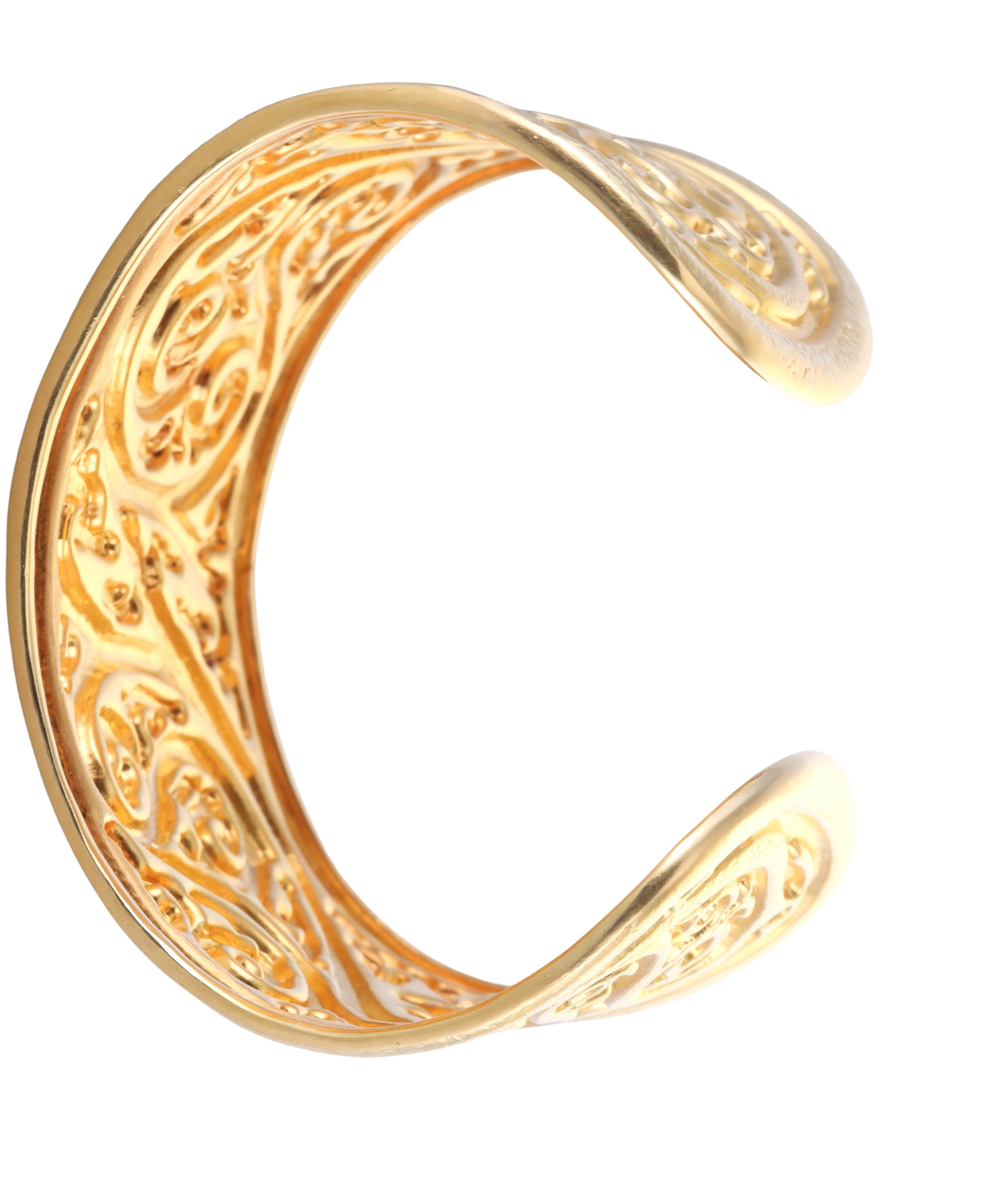Gorgeous 18k yellow gold cuff bracelet, crafted by iconic Greek designer Ilias Lalaounis. The bracelet will fit an approximately 7.5-7.75