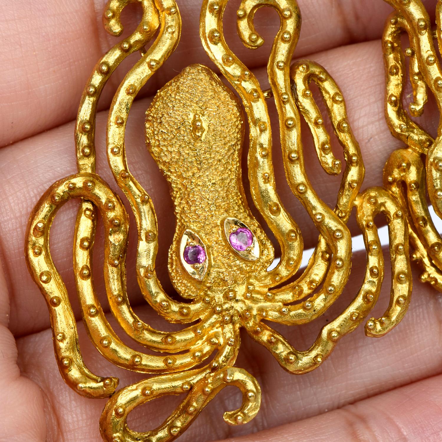 Vintage Ilias Lalaounis, these earrings represent the mystery, flexibility, fluidity & adaptability of the Octopus, 

Crafted in solid 18K yellow gold and weighing 25.2 grams, with a beaded grain finish & polished accents.

The eyes are composed of