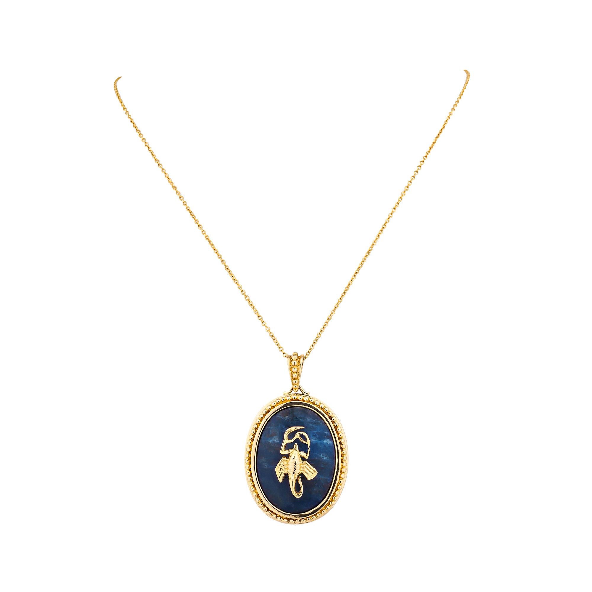 Scorpios are born leaders and live to experience and express emotions, and this vintage Lalaounis scorpio zodiac pendant will lead the way.  Mounted in 18 karat yellow gold, the center scorpion rests on a oval cut carved sodalite background with a