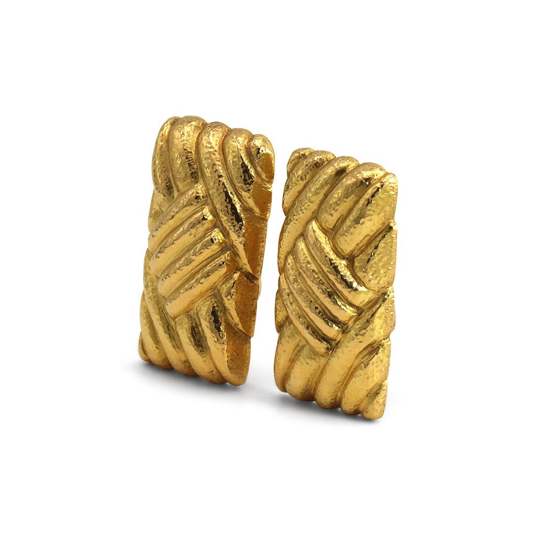Authentic Lalaounis vintage earrings crafted in 18 karat yellow gold. These glamorous earrings feature a textured gold geometric design with clip back closures for non-pierced ears. At its widest point, the earrings measures  1.19 inches x .65