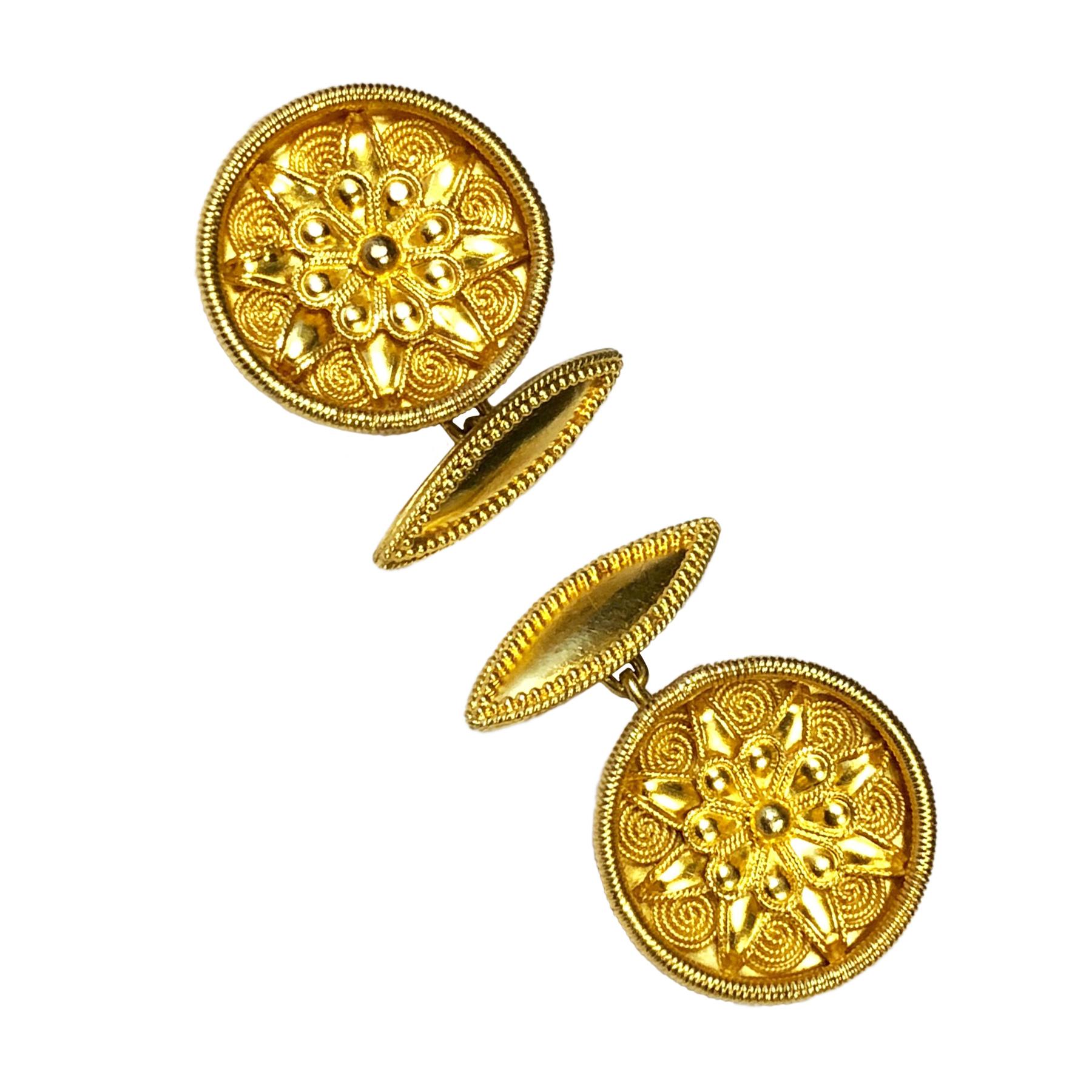 Circa 1990s Ilias Lalaounis Greece 18K yellow Gold Cuff Links and Tuxedo dress shirt studs set. In the Famous Lalaounis Ancient Grecian style the Cufflinks measure 5/8 inch in diameter and the shirt studs measure 1/2 inch in diameter.  Excellent,