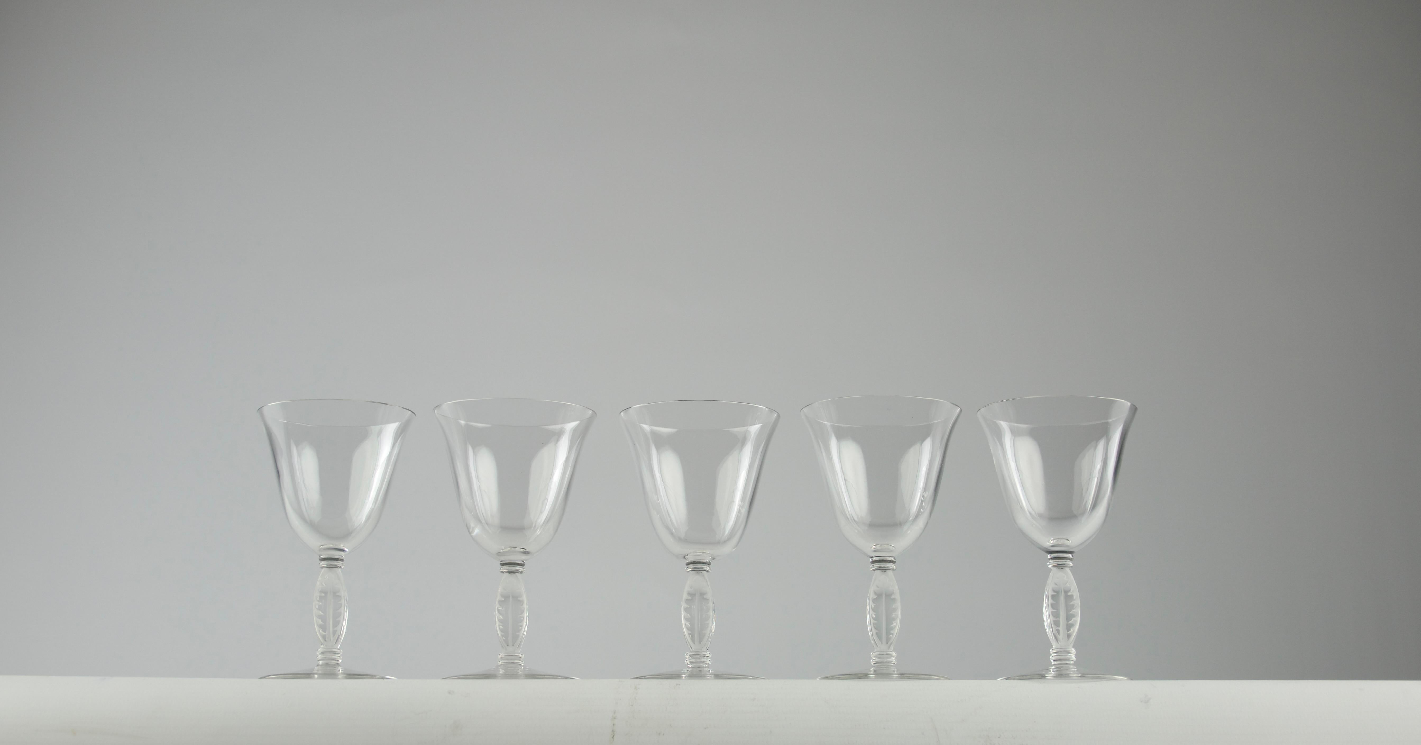 Beautiful Lalique Fontainebleau set of five liquor glasses. Other wine glasses from the same collection are available in the shop.

In very good condition.

Dimensions in cm ( H x D ) : 11 x 6.5

Secure shipping.

First designed by Rene Lalique in