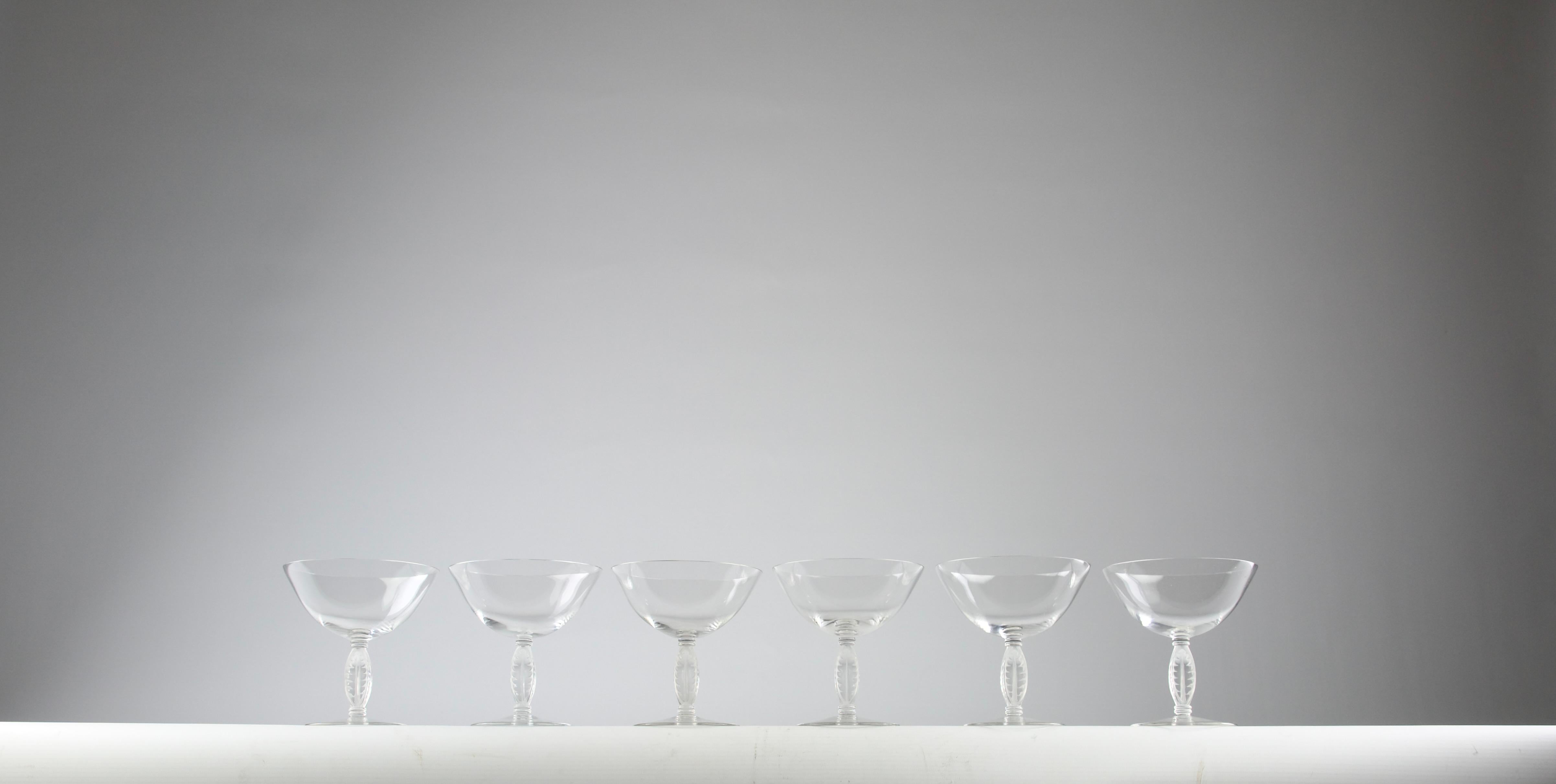 Beautiful Lalique Fontainebleau champagne set of six. Other wine glasses from the same collection are available in the shop.

In very good condition.

Dimensions in cm ( H x D ) : 11.2 x 10.5

Secure shipping.

First designed by Rene Lalique in
