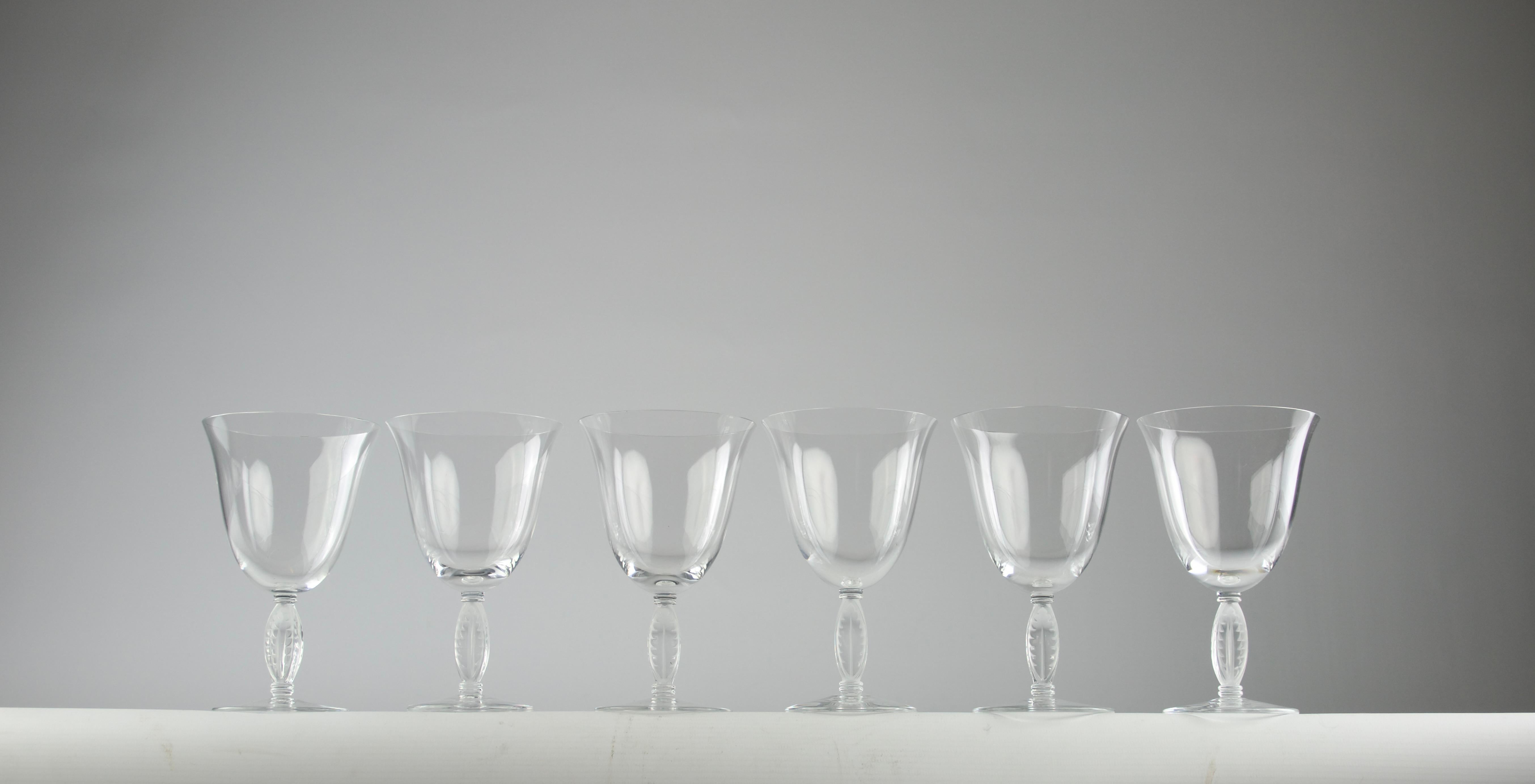 Beautiful Lalique Fontainebleau set of six red wine glasses. Other wine glasses from the same collection are available in the shop.

In very good condition.

Dimensions in cm ( H x D ) : 13 x 8

Secure shipping.

First designed by Rene Lalique in
