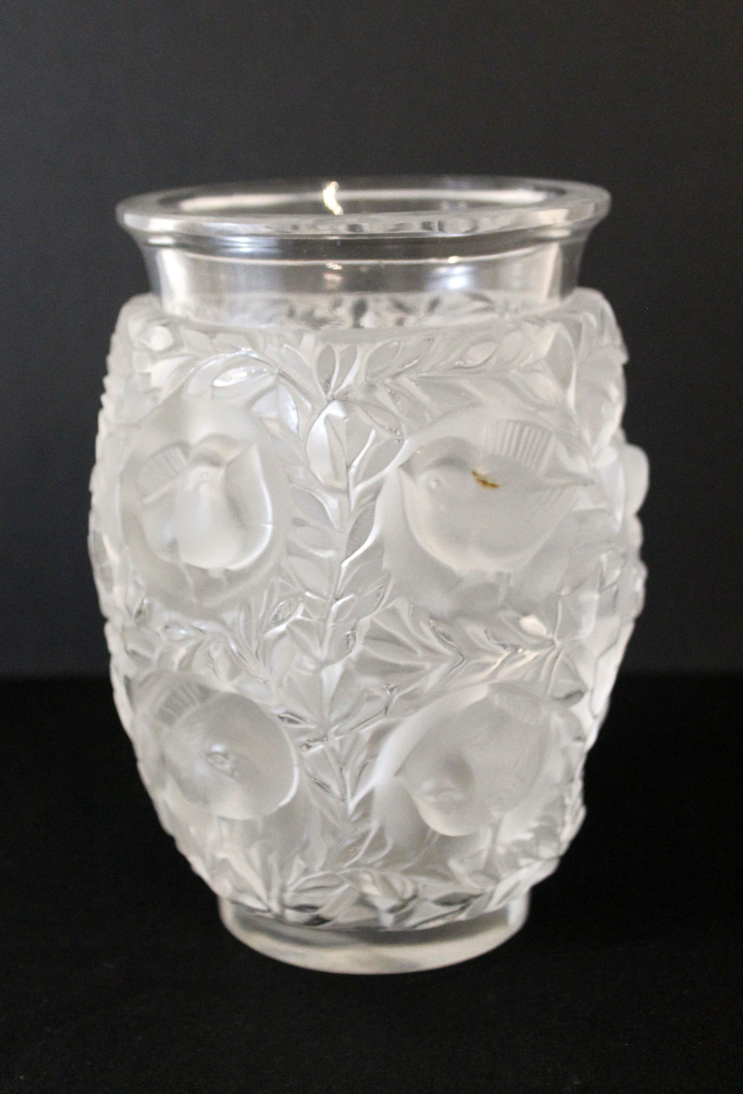 A classic decorative item – the Bagatelle vase by Lalique – one of the most popular designs. Per Lalique, the style is from a naturalist inspiration and was drawn for the first time in 1939. Combining fauna and flora themes, the vase takes us to a