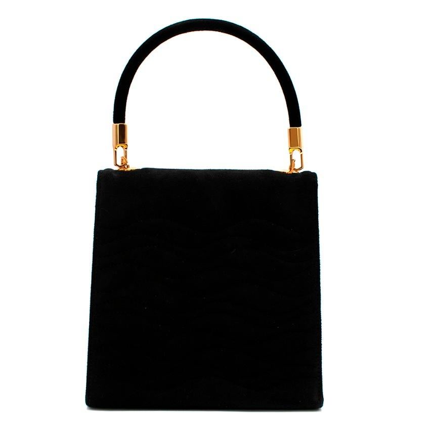Lalique Black Suede Vintage Mini Top Handle Bag

- Made of soft suede 
- Wave like quilting pattern 
- Twist lock to the front 
- Gold tone hardware 
- Small zipped inner pocket 
- Original box and dust bag 
- Timeless elegant design