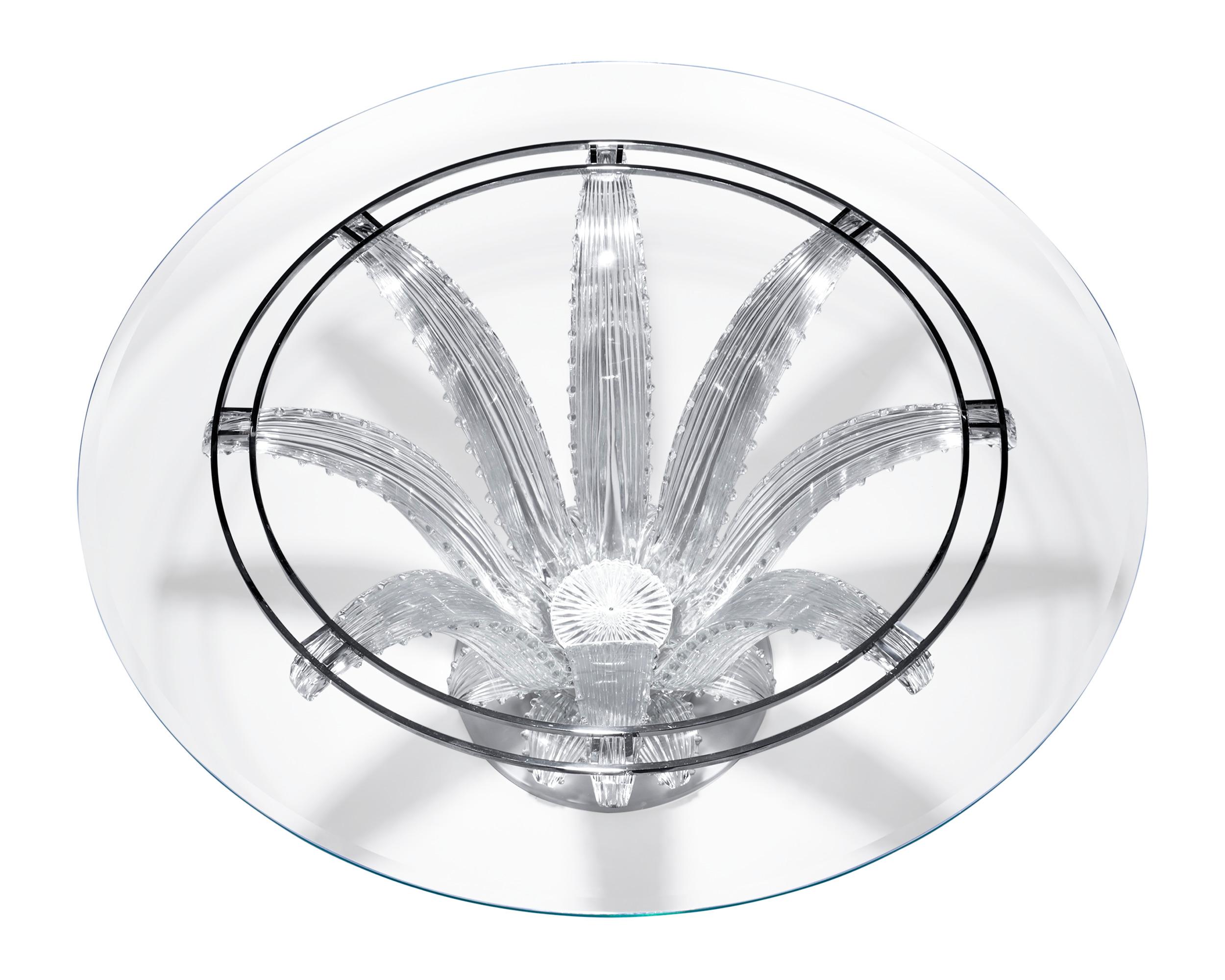 Hailing from the famed French cristallerie Lalique, this chic circular cactus table embodies the elegance and artistry of the firm’s best creations. Designed in 1951 by Marc Lalique, son of René Lalique, this table features one of the French firm’s