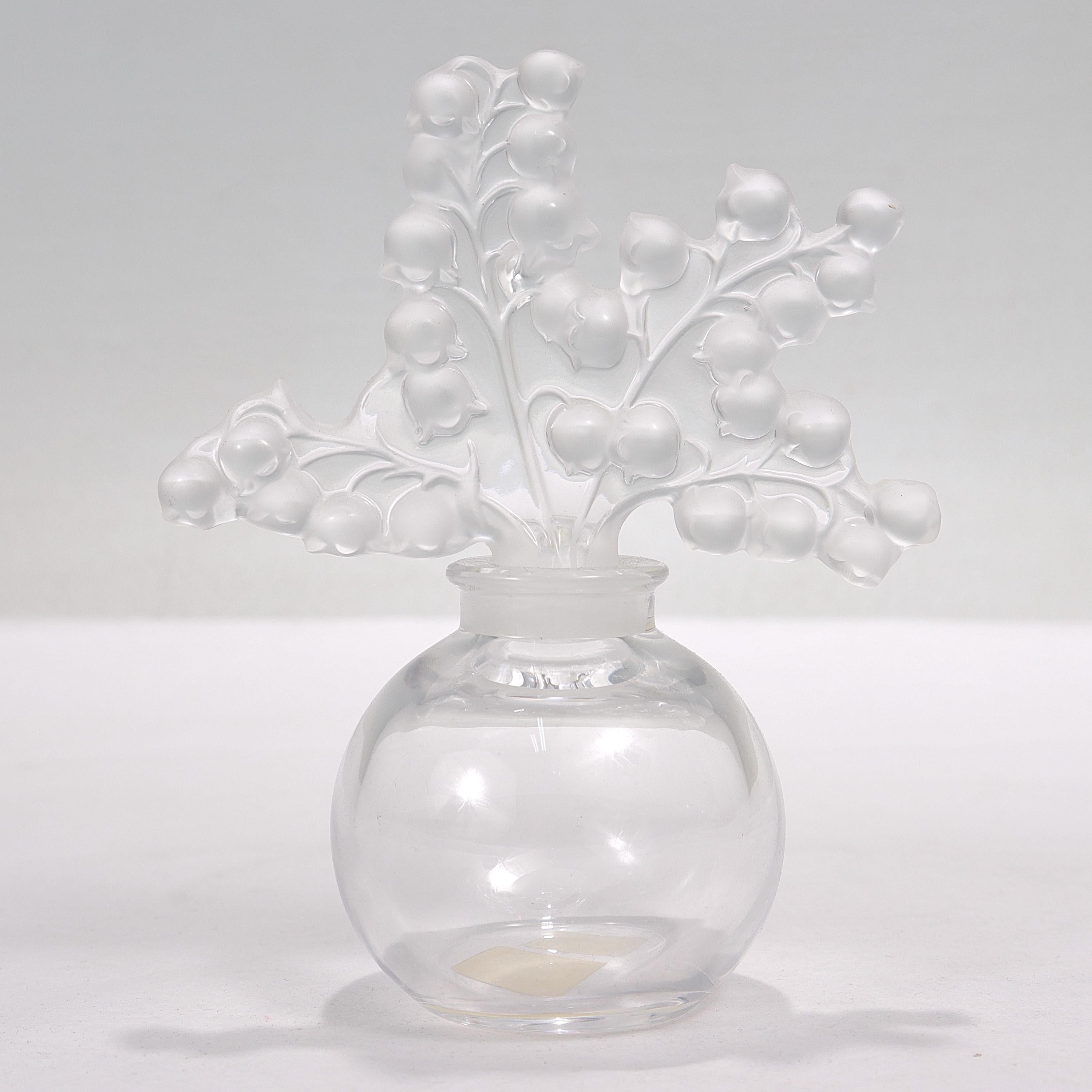 A fine French art glass perfume bottle.

By Lalique.

Entitled 'Clairefontaine' - a reference to the Clairefontaine garden – located in the South West of Paris (France) – which was one of René Lalique's major source of inspiration. The perfume