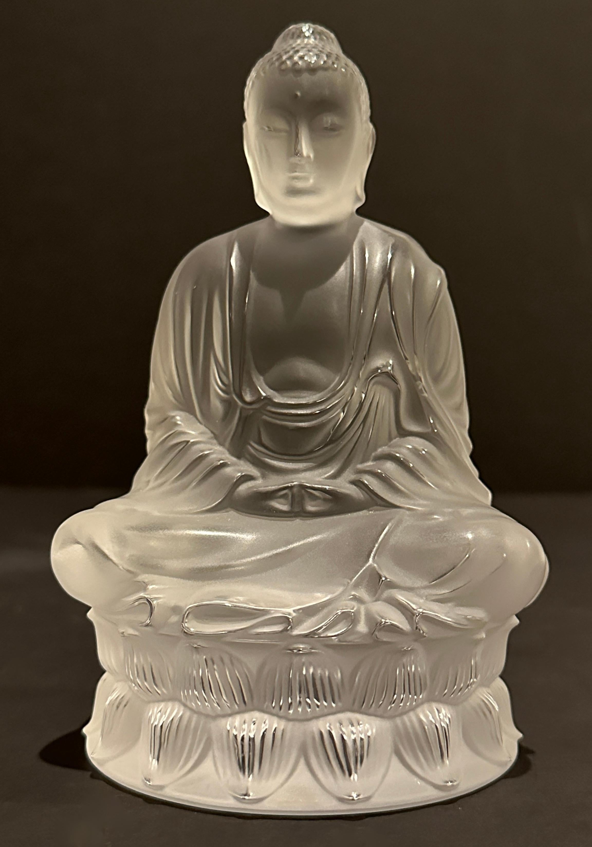 A stunning rendition of the sage on whose teachings Buddhism was founded. The Buddha meditates solemnly in this Fine mouth-blown and hand carved crystal sculpture by Lalique. Delicately hand-finished to a satin glow. Handmade in France.