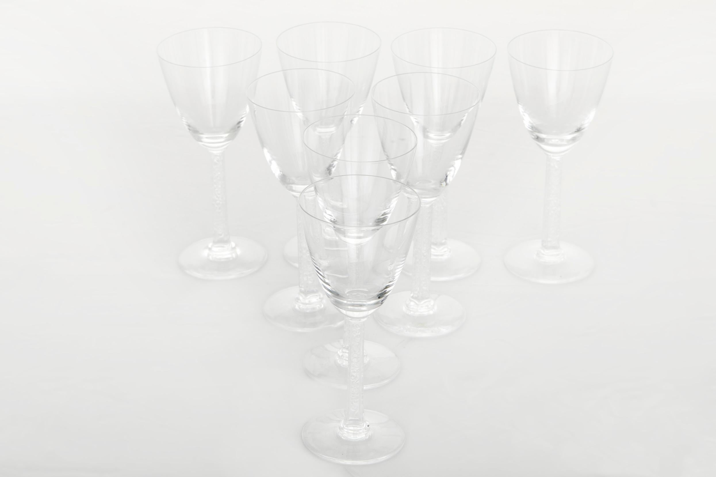 20th Century Lalique crystal tableware / barware service for ten people . Each glass is in great condition . Minor wear consistent with age / use . Maker's mark undersigned . Each glass measures 6 1/2 inches tall X 3 inches diameter.