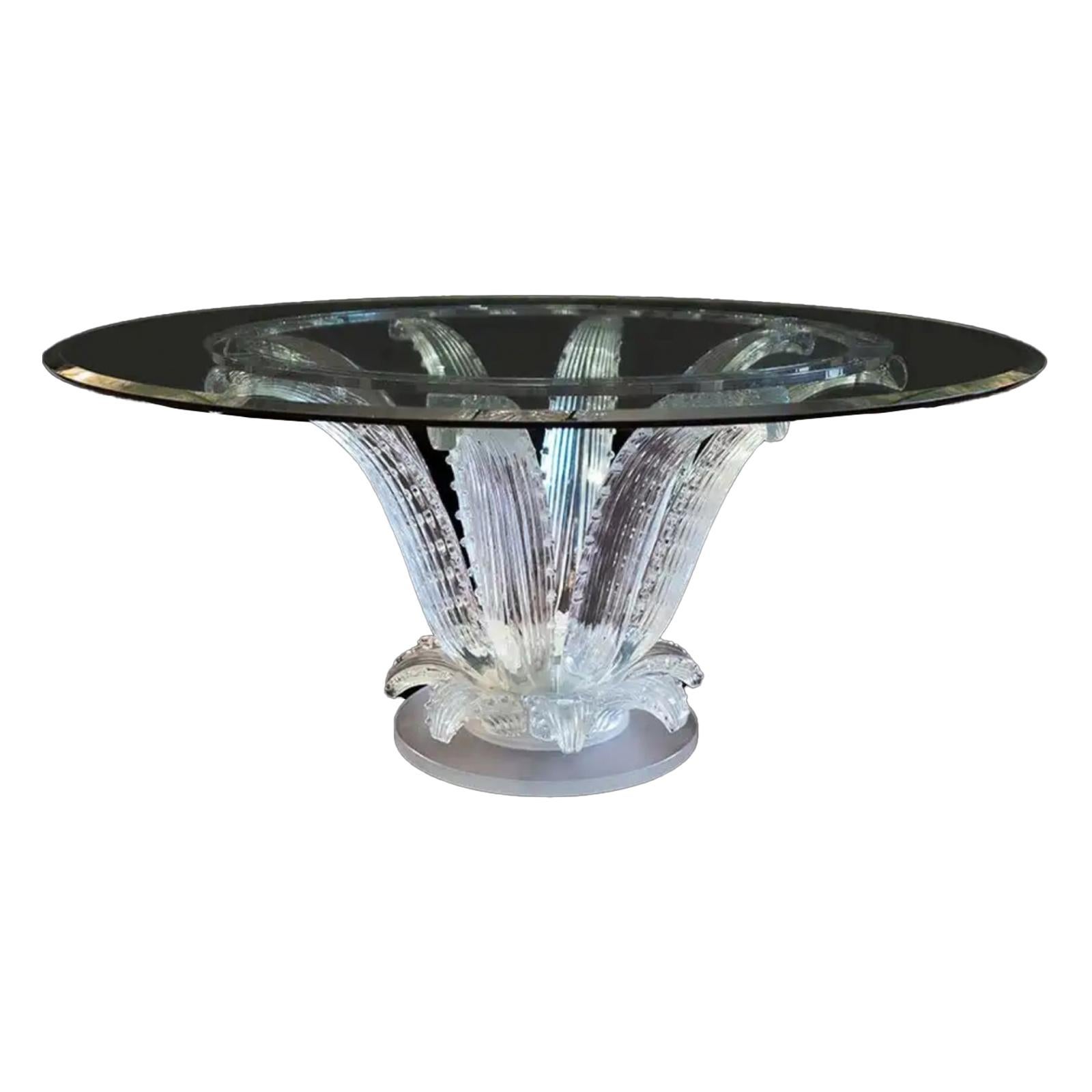 Created in 1951 by Marc Lalique, the Cactus table fits into the most creative spaces of contemporary decoration. The swirls of crystal punctuated by light are a vertigo of a thousand lights, effortlessly absorbing the gaze.

This sumptuous table