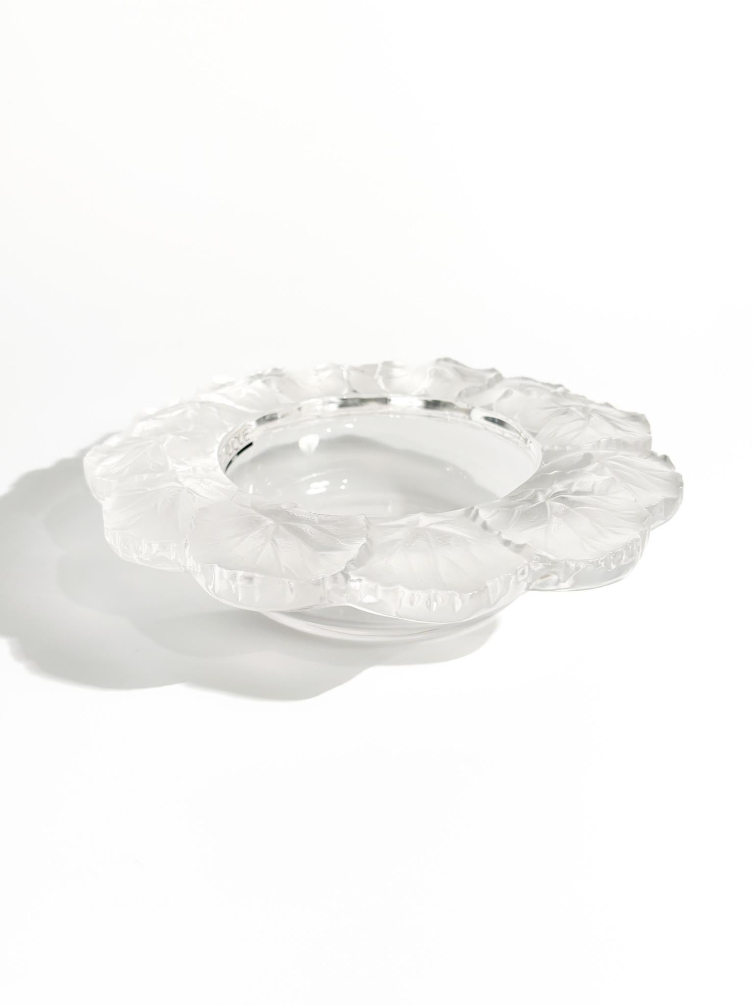 Crystal centerpiece bowl by Lalique, Honfleur model, made in the 1970s

Ø cm 21 h cm 6

Lalique crystal refers to glassware produced by the French luxury brand Lalique. Lalique is famous for its exquisite crystal sculptures, vases, bowls, jewelry