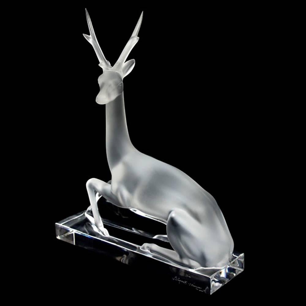 This is a wonderful, large Lalique frosted crystal recumbant stag figurine. The registered name of the piece is 