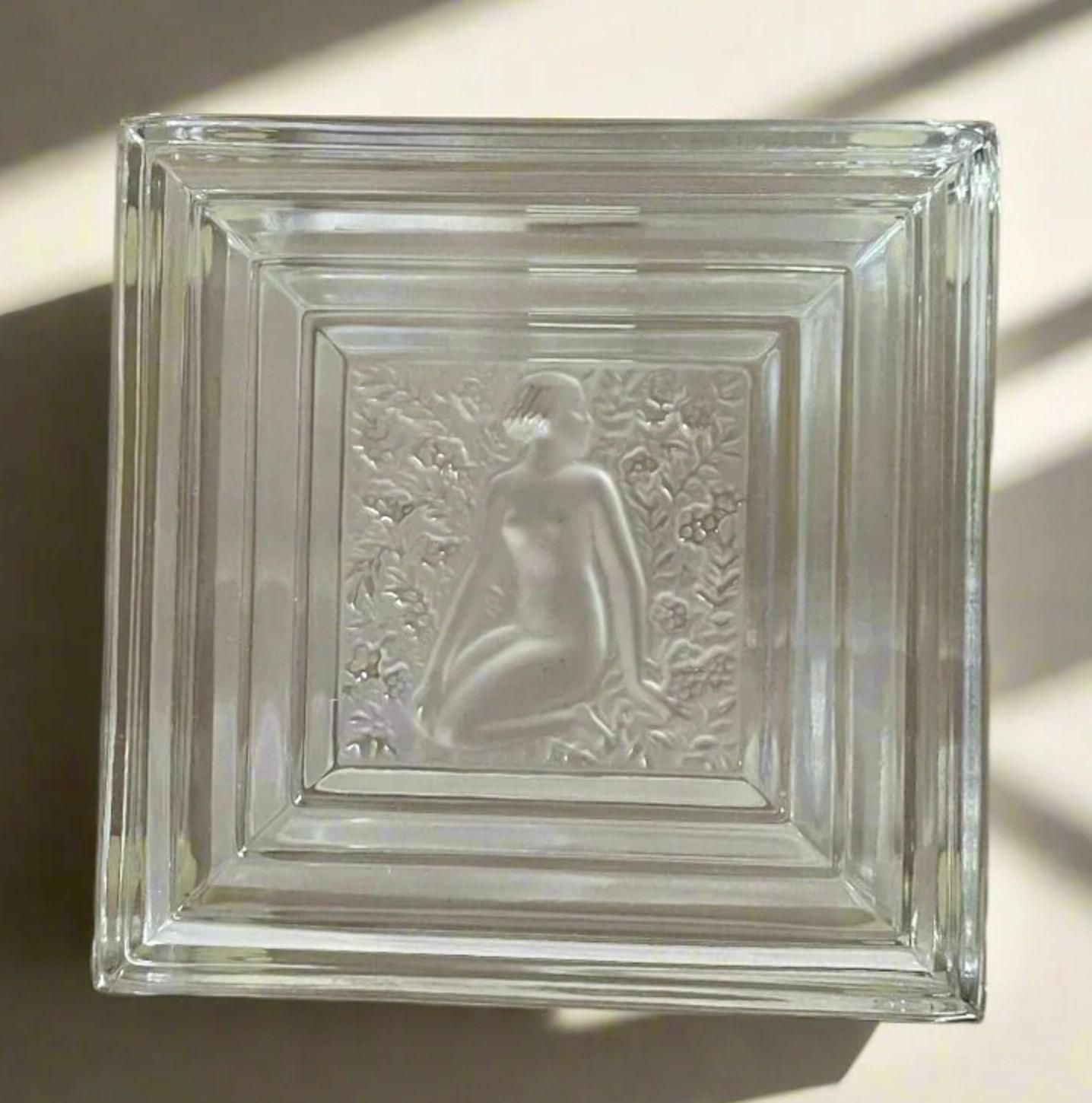 From Lalique Crystal, a square shaped covered box in the  ‘Duncan’ pattern, France, circa 1980s.

The Duncan Line by René Lalique was designed in 1931. The pattern was inspired by the American dancer Isadora Duncan and her portrayal of ancient Greek